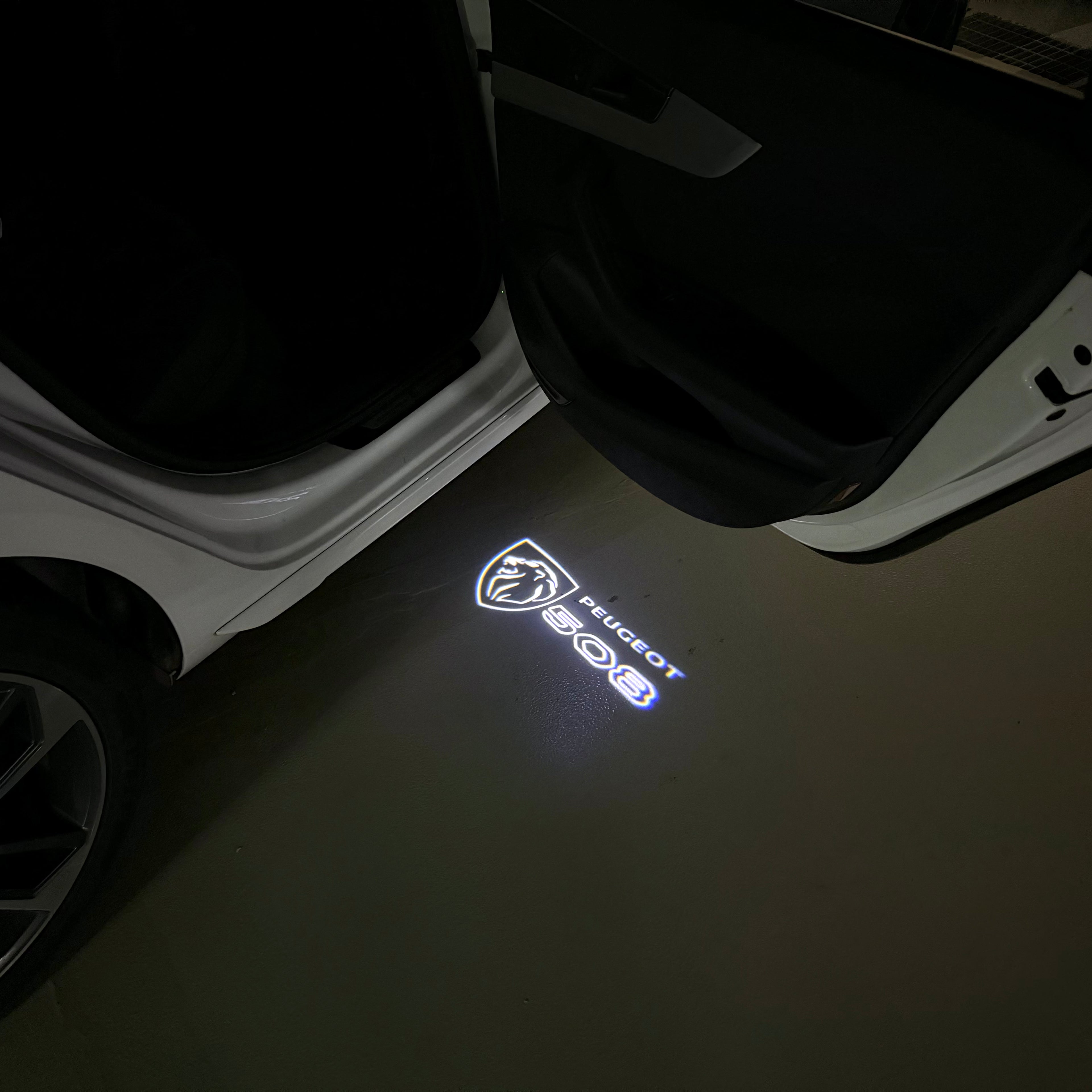 PEUGEOT   408  LOGO PROJECTOT LIGHTS (quantity 1 = 1 sets/2 door lights) Nr.6024q40
