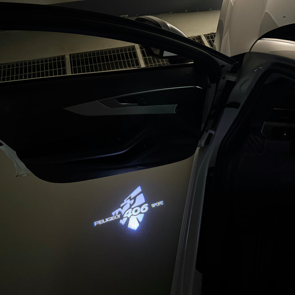 PEUGEOT  406 SPORT  LOGO PROJECTOT LIGHTS (quantity 1 = 1 sets/2 door lights) Nr.6024q30