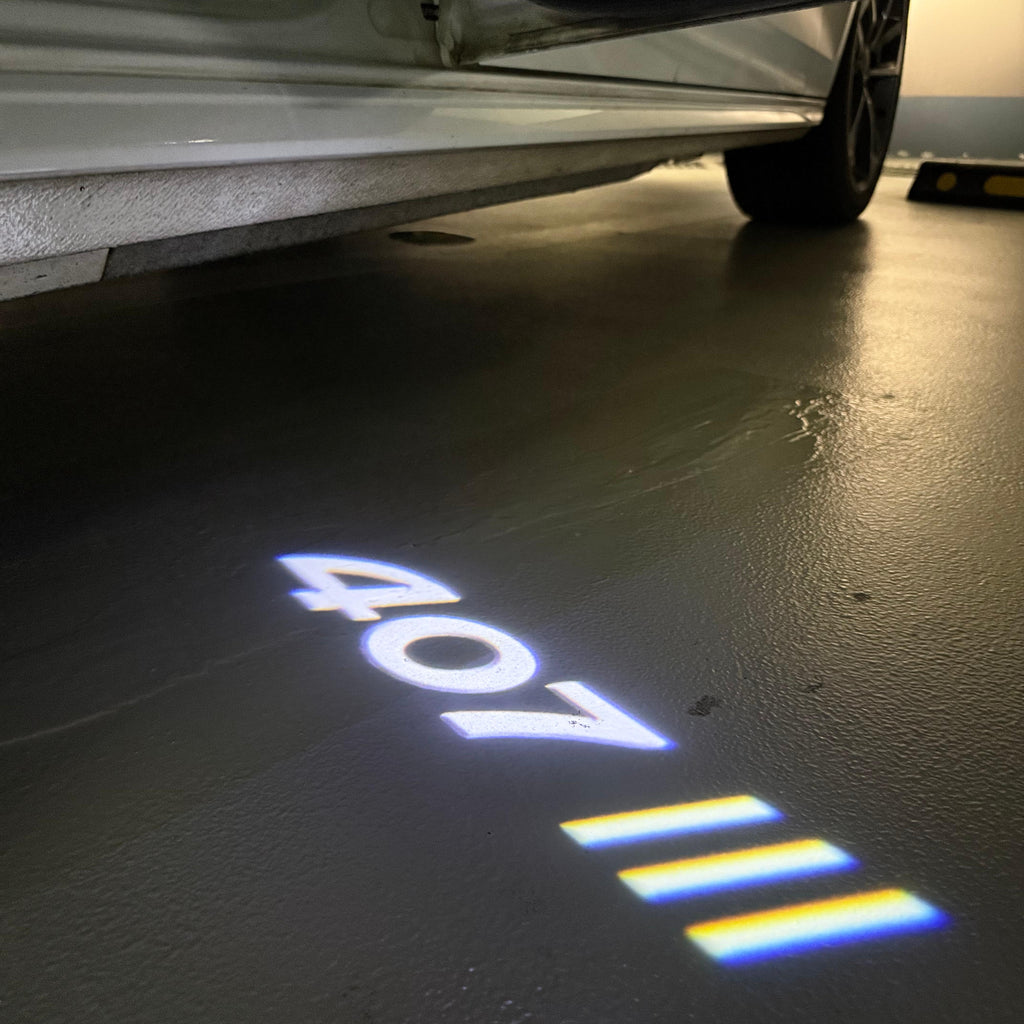 PEUGEOT 407  LOGO PROJECTOT LIGHTS (quantity 1 = 1 sets/2 door lights) Nr.6024q31