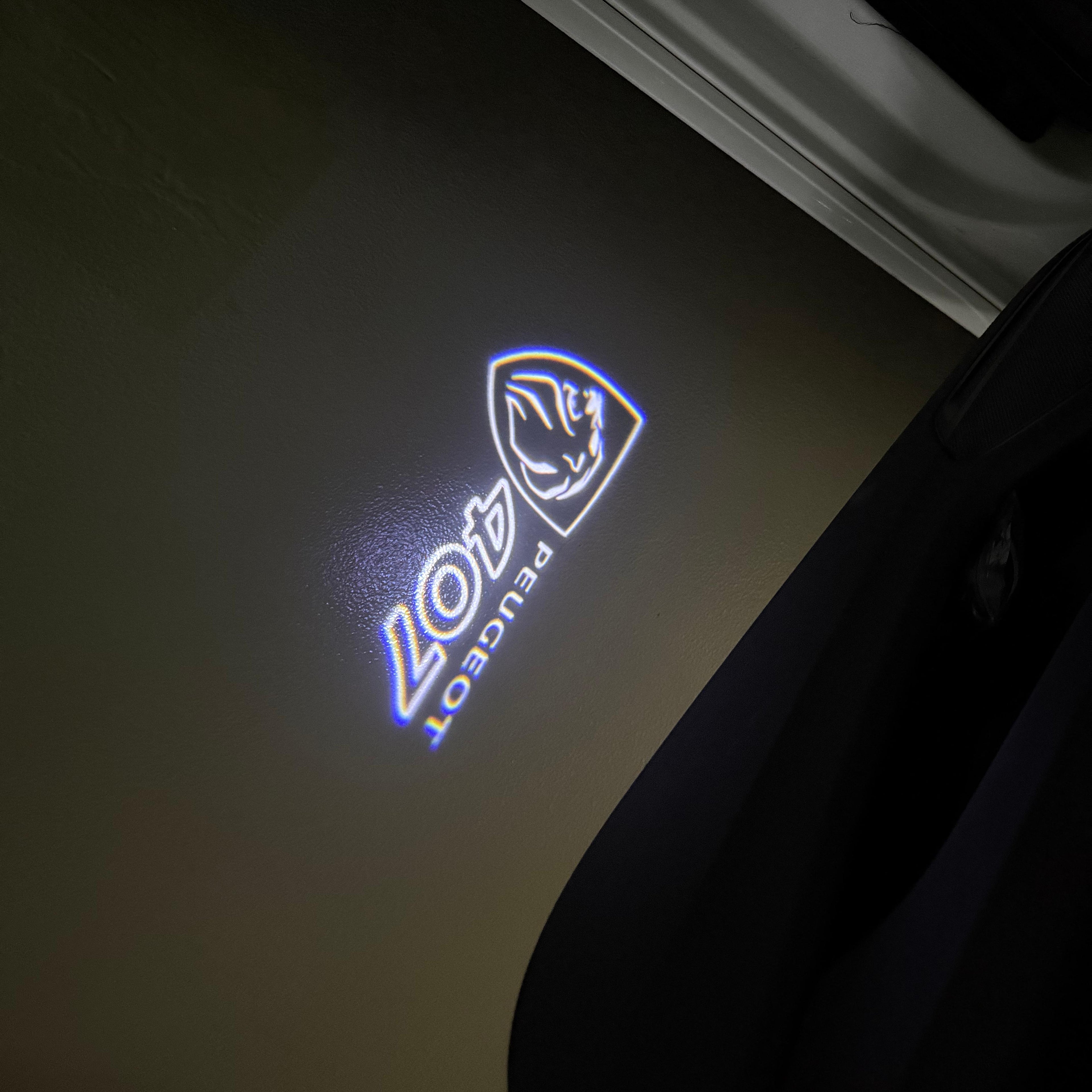 PEUGEOT  407 LOGO PROJECTOT LIGHTS (quantity 1 = 1 sets/2 door lights) Nr.6024q33
