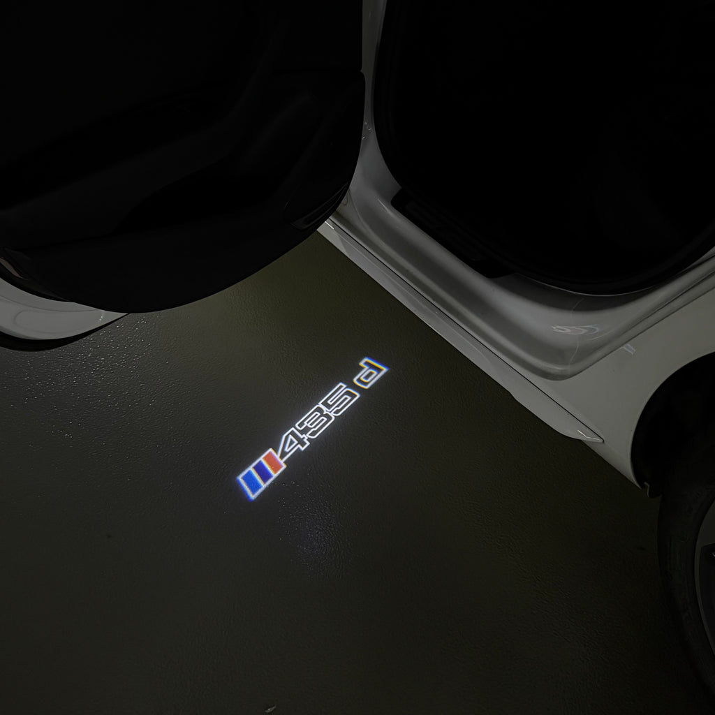 BMW M3 LOGO PROJECTOR LIGHTS Nr.24 (الكمية 1 = 1 مجموعة / 2 أضواء باب)