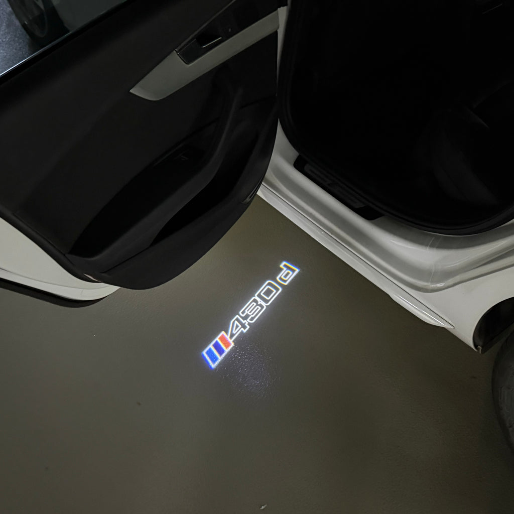 BMW M3 LOGO PROJECTOR LIGHTS Nr.24 (الكمية 1 = 1 مجموعة / 2 أضواء باب)