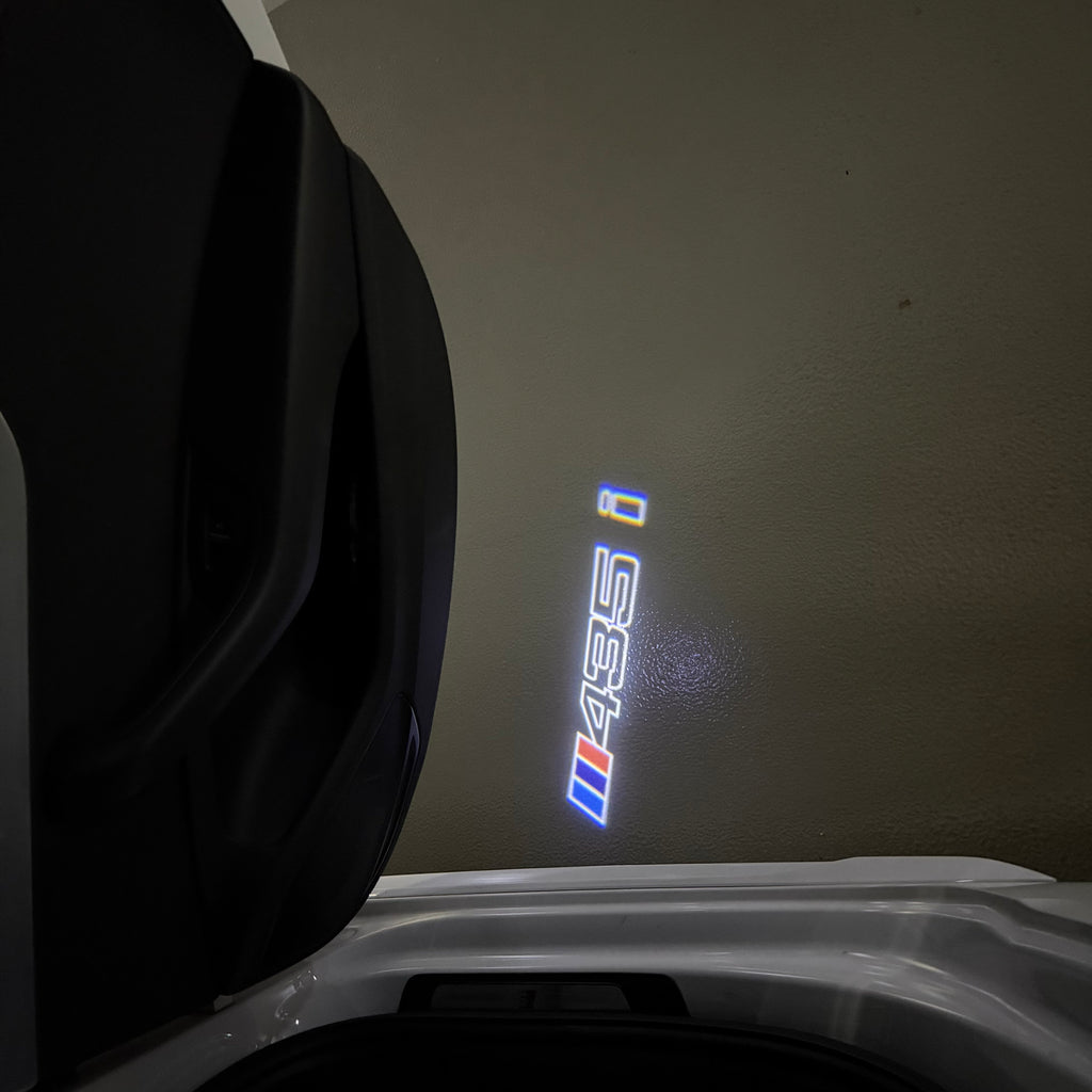BMW M3 LOGO PROJECTOR LIGHTS Nr.24 (الكمية 1 = 1 مجموعة / 2 أضواء باب)