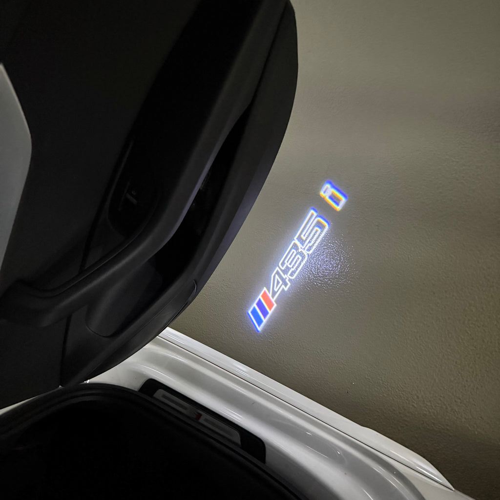 BMW M3 LOGO PROJECTOR LIGHTS Nr.24 (الكمية 1 = 1 مجموعة / 2 أضواء باب)