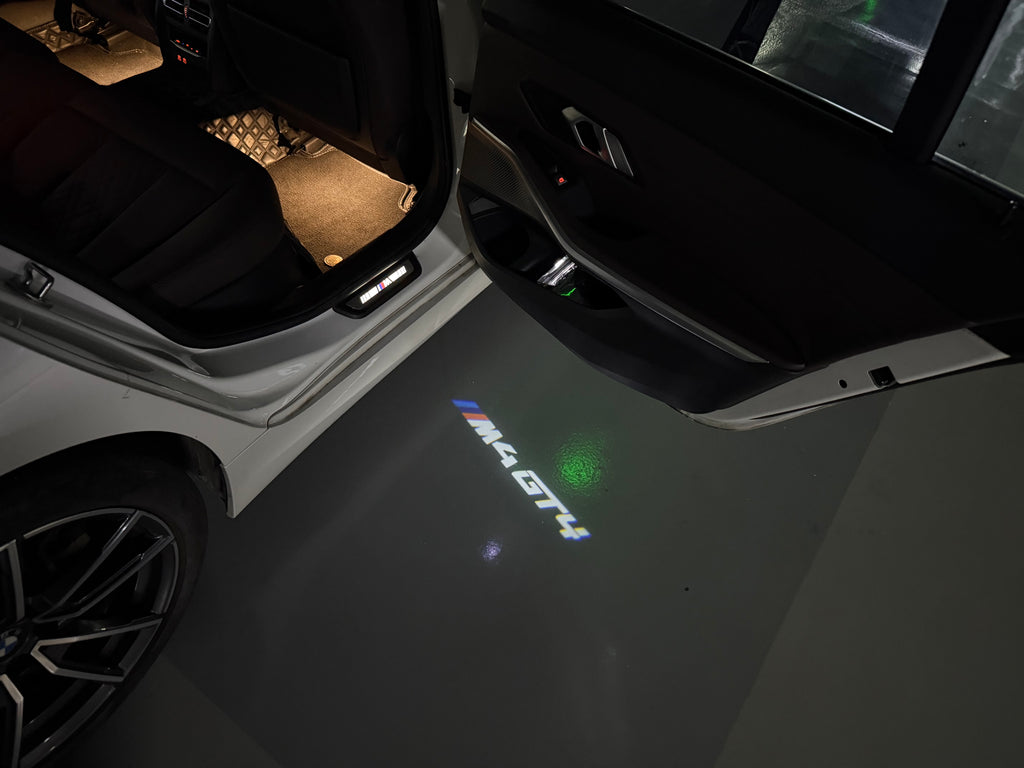 BMW M3 LOGO PROJECTOR LIGHTS Nr.24 (الكمية 1 = 1 مجموعة / 2 أضواء باب)