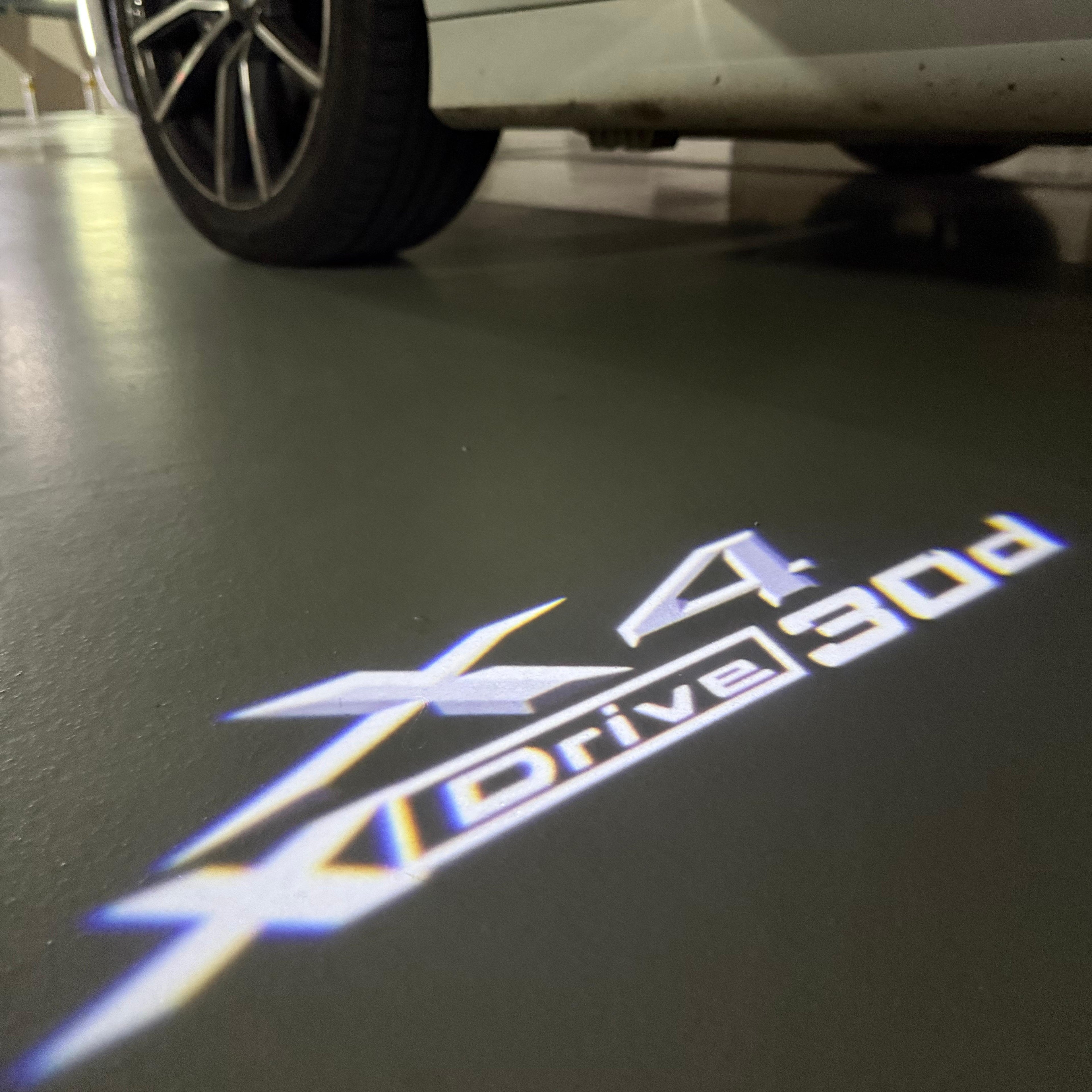 BMW X4 X DRIVE 30d LOGO PROJECTOT LIGHTS (quantity 1 = 1 sets/2 door lights) Nr.6024q0t033