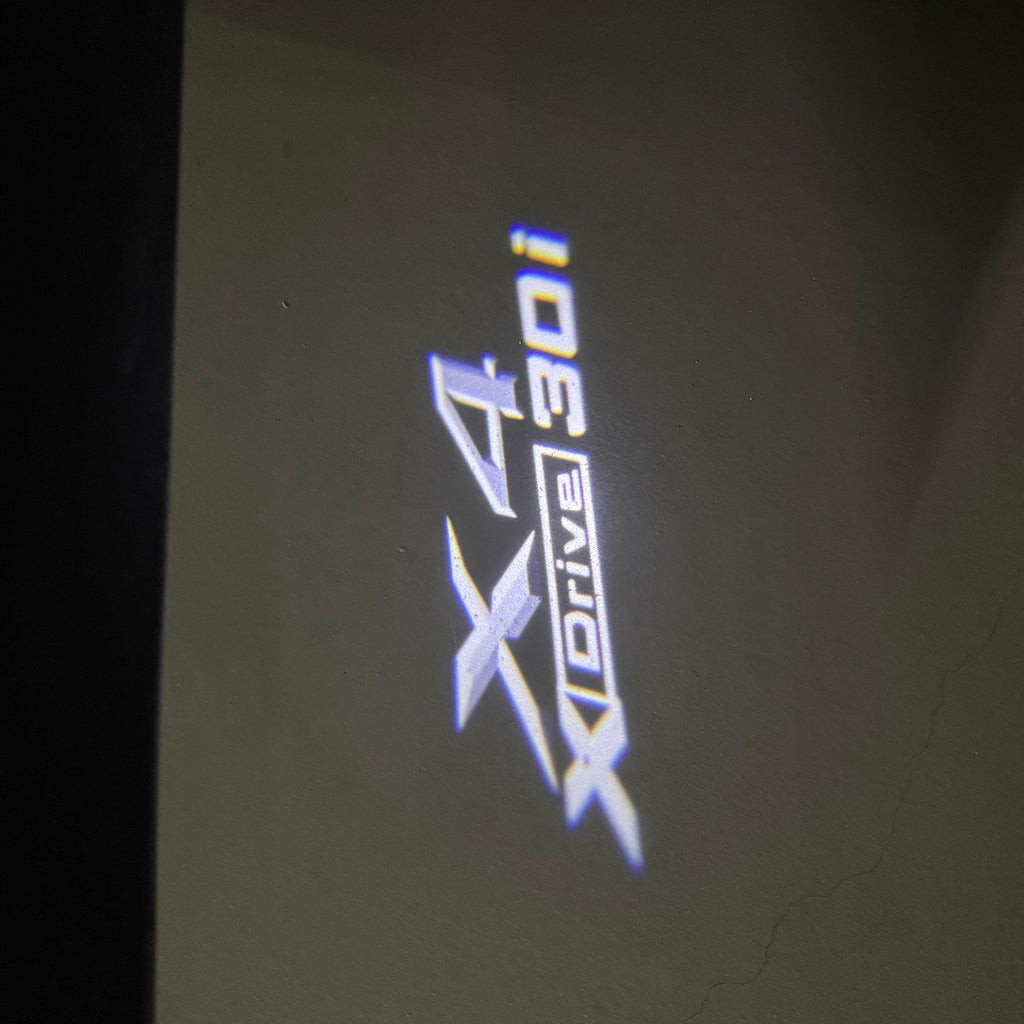 BMW X4 Drive 30i  LOGO PROJECTOT LIGHTS (quantity 1 = 1 sets/2 door lights) Nr.6024q0t038