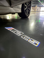BMW M3 LOGO PROJECTOR LIGHTS Nr.24 (الكمية 1 = 1 مجموعة / 2 أضواء باب)