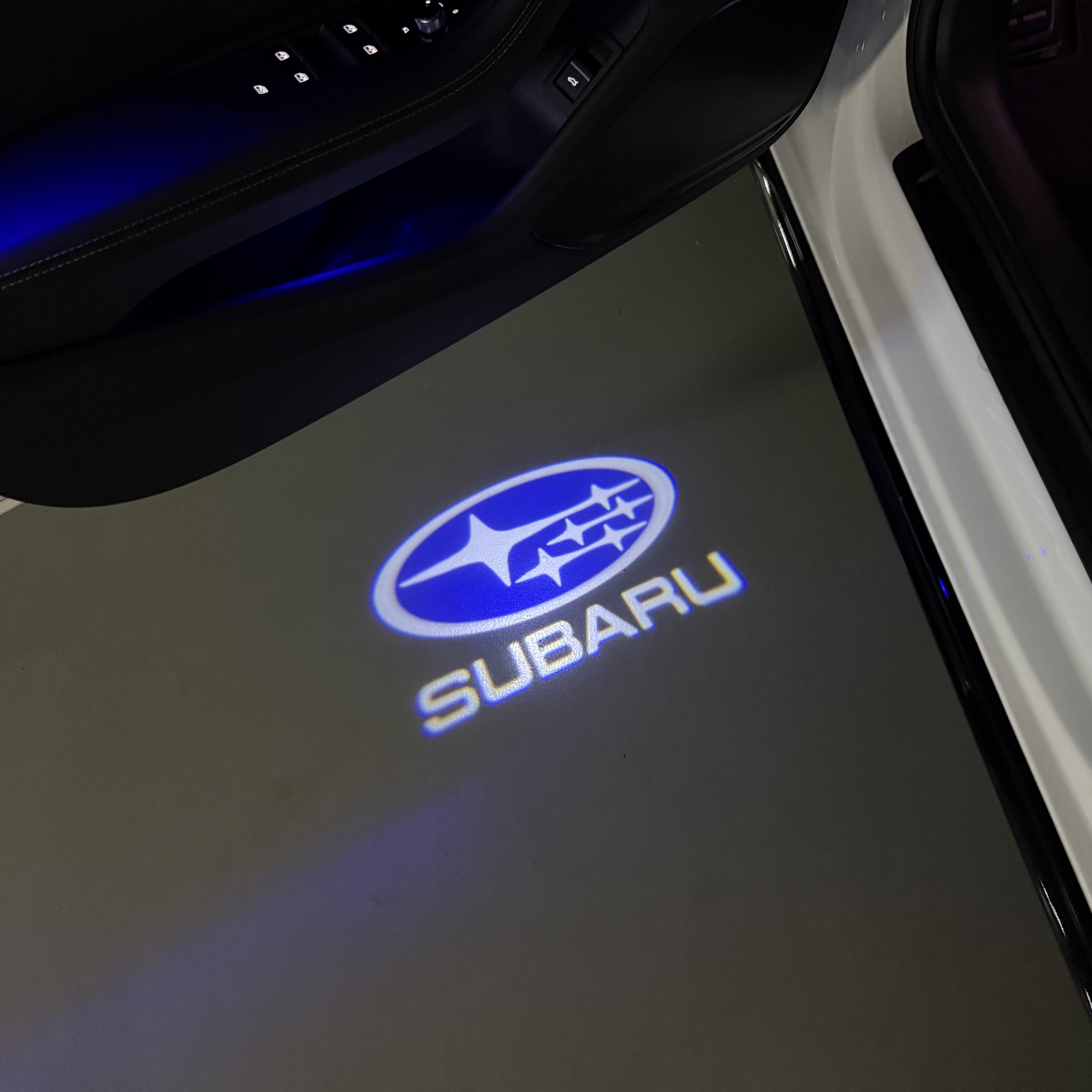 SUBARU ORIGINAL LOGO PROJECROTR LIGHTS (quantity 1 = 1 sets/2 door lights) Nr.12
