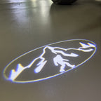 SUBARU ORIGINAL LOGO PROJECROTR LIGHTS (quantity 1 = 1 sets/2 door lights) Nr.03A4