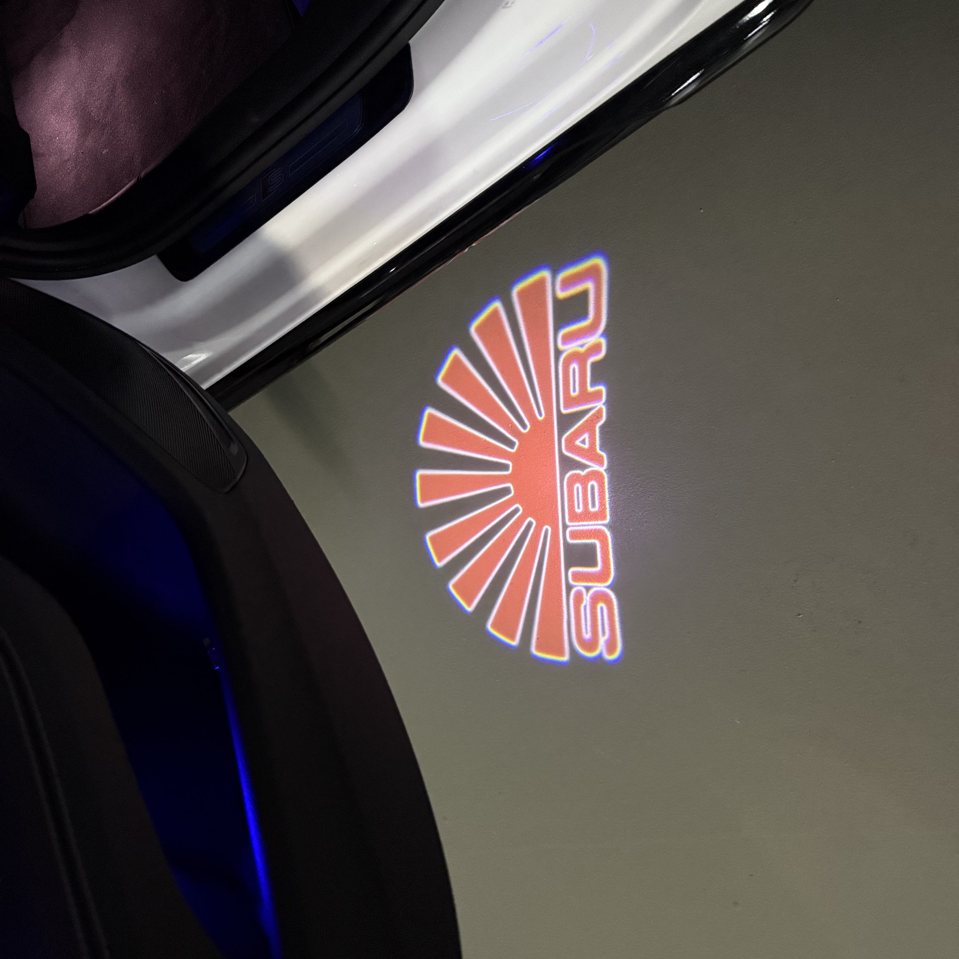 SUBARU ORIGINAL LOGO PROJECROTR LIGHTS (quantity 1 = 1 sets/2 door lights) Nr.7