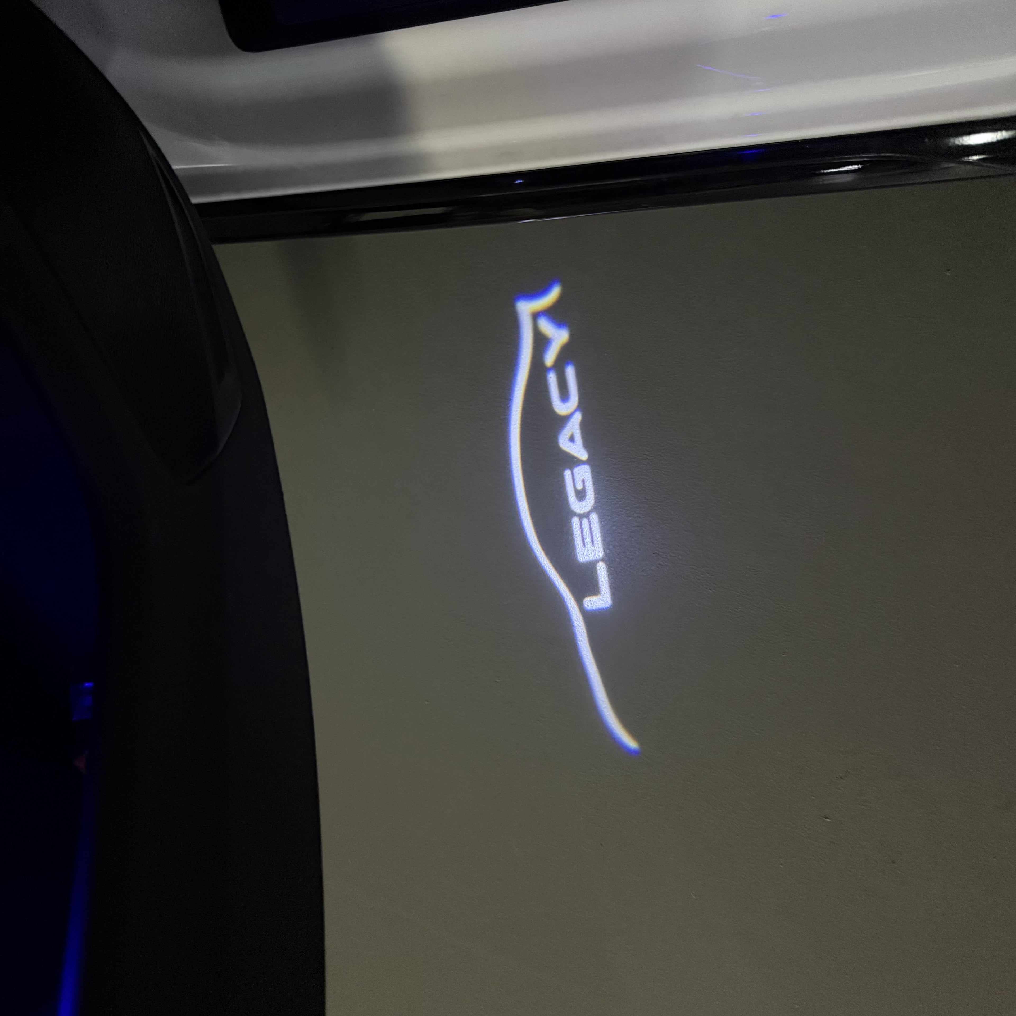 SUBARU LEGACY LOGO PROJECROTR LIGHTS (quantity 1 = 1 sets/2 door lights) Nr.03A36