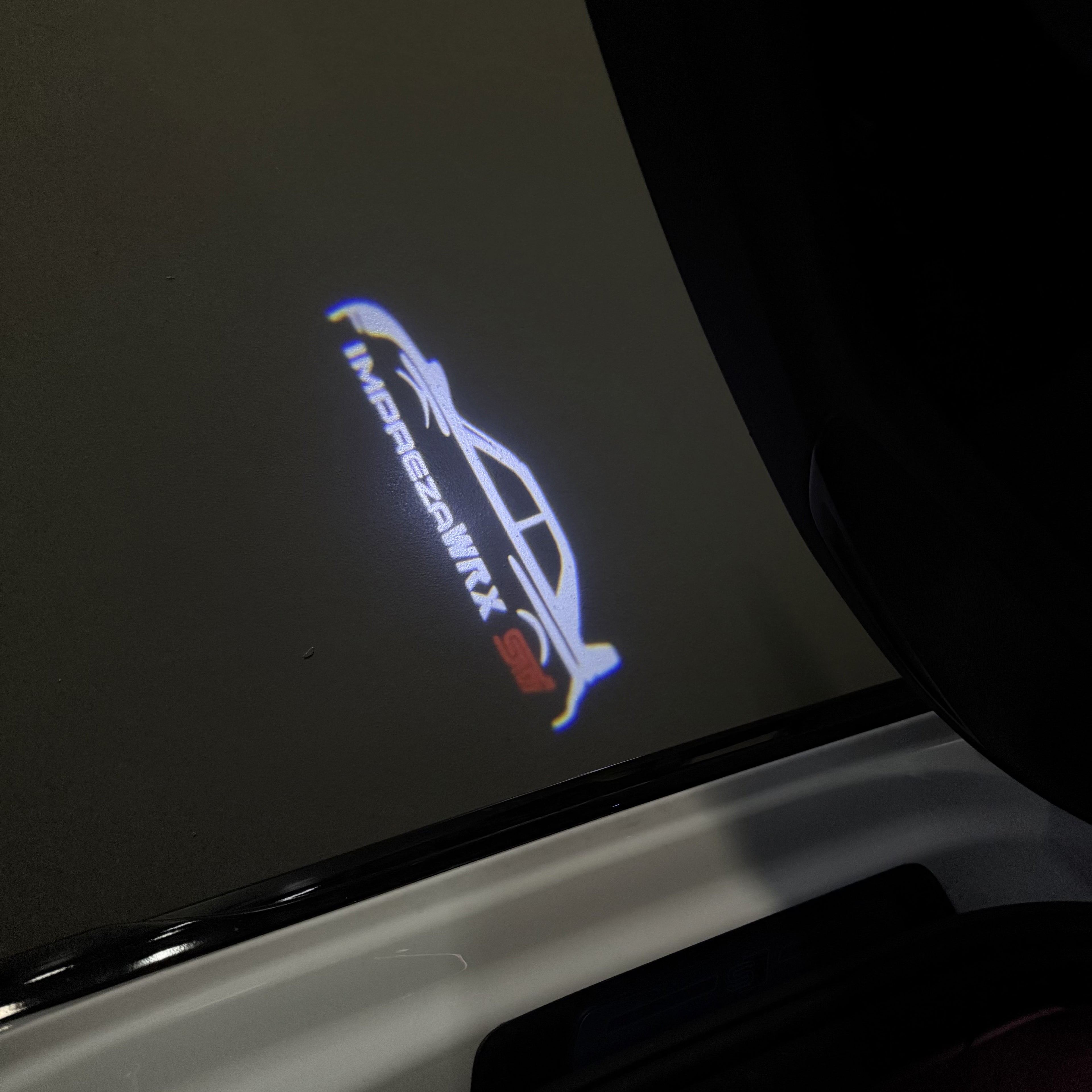 SUBARU IMPREZA LOGO PROJECROTR LIGHTS (quantity 1 = 1 sets/2 door lights) Nr.03A45
