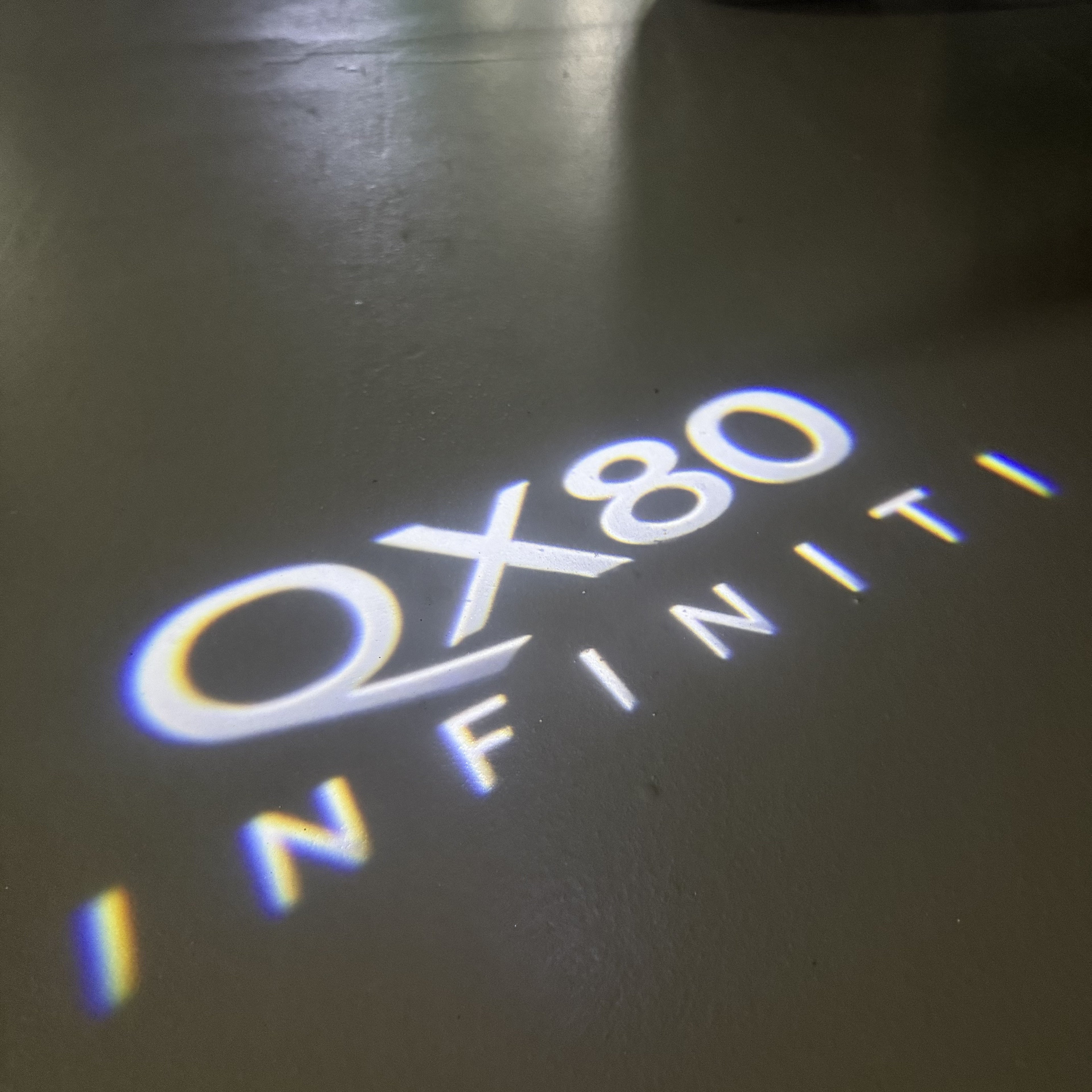 LUCI PROIETTORI LOGO INFINITI QX56 Nr.74 (quantità 1 = 1 set / 2 luci porta)