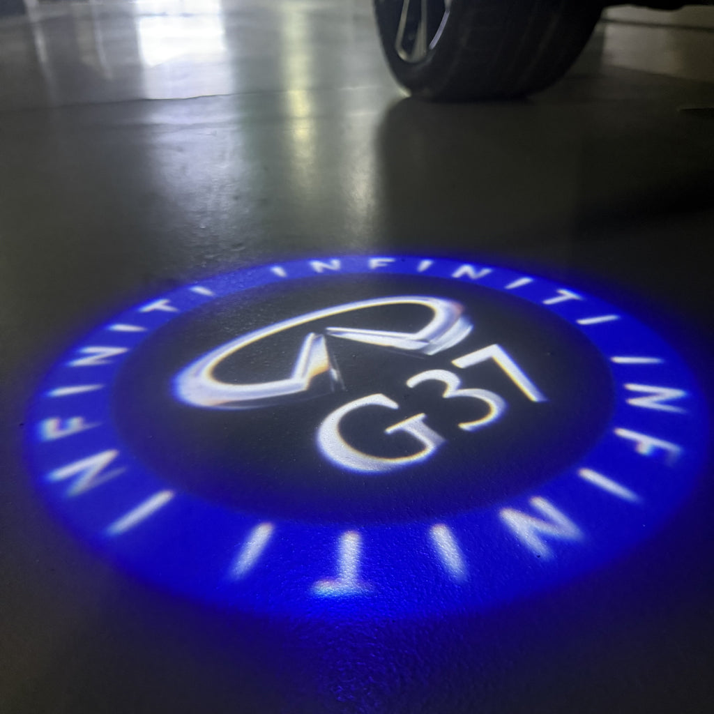 LUCI PROIETTORI LOGO INFINITI QX56 Nr.74 (quantità 1 = 1 set / 2 luci porta)