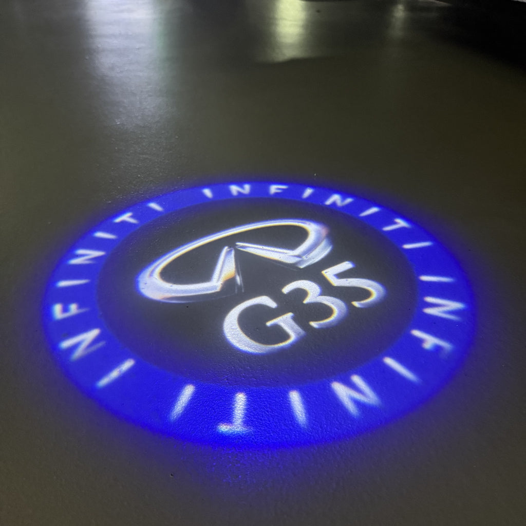 LUCI PROIETTORI LOGO INFINITI QX56 Nr.74 (quantità 1 = 1 set / 2 luci porta)