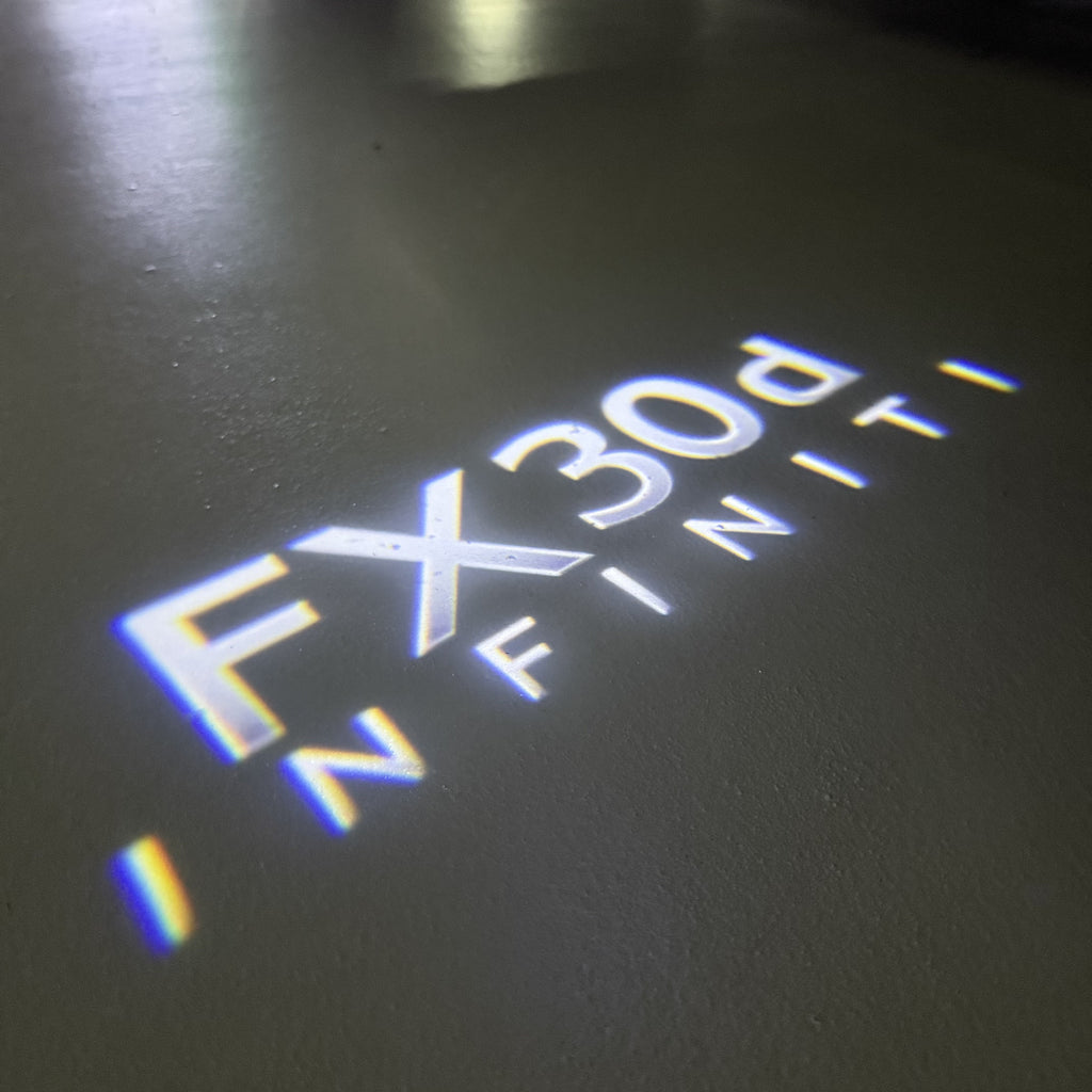 LUCI PROIETTORI LOGO INFINITI QX56 Nr.74 (quantità 1 = 1 set / 2 luci porta)