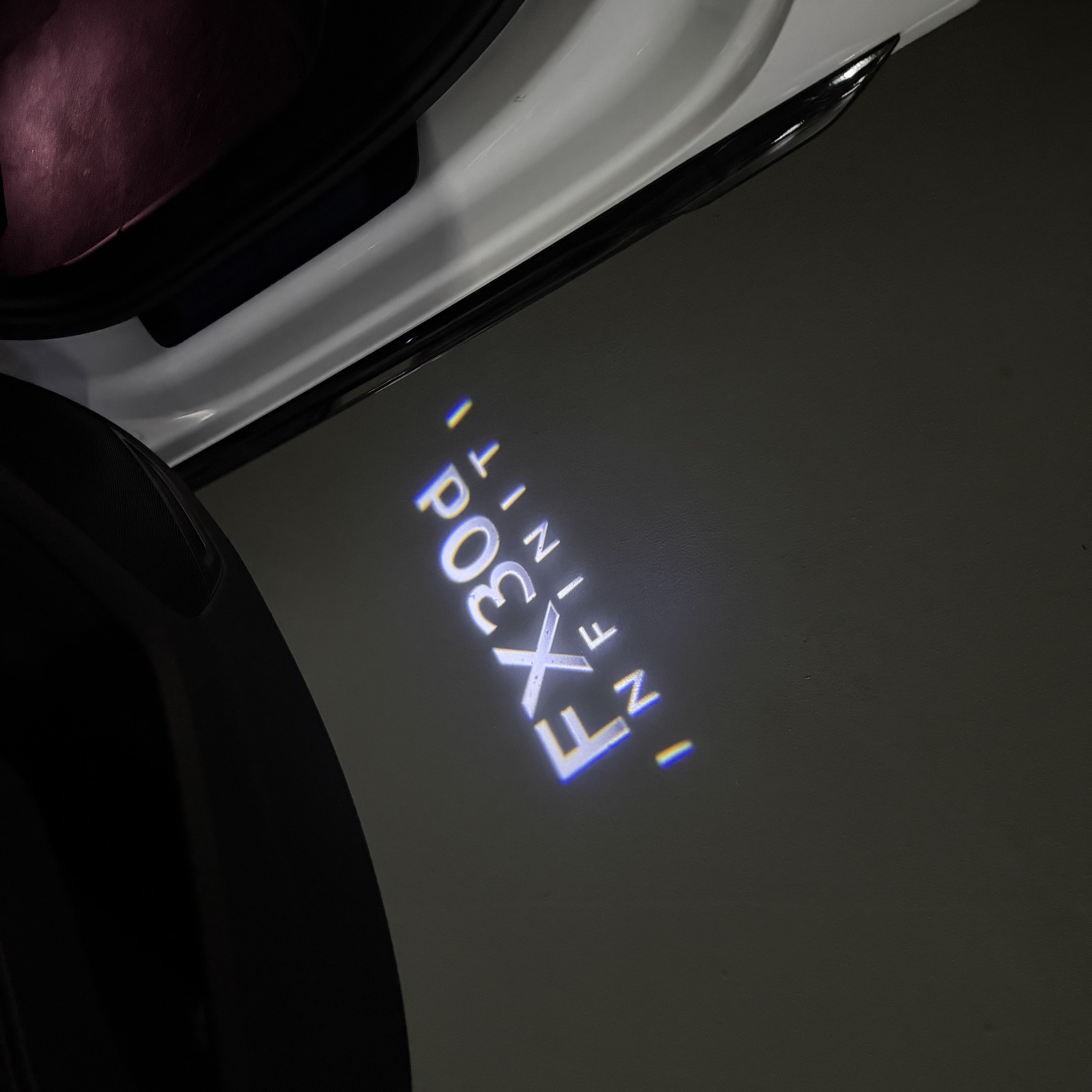 LUCI PROIETTORI LOGO INFINITI QX56 Nr.74 (quantità 1 = 1 set / 2 luci porta)