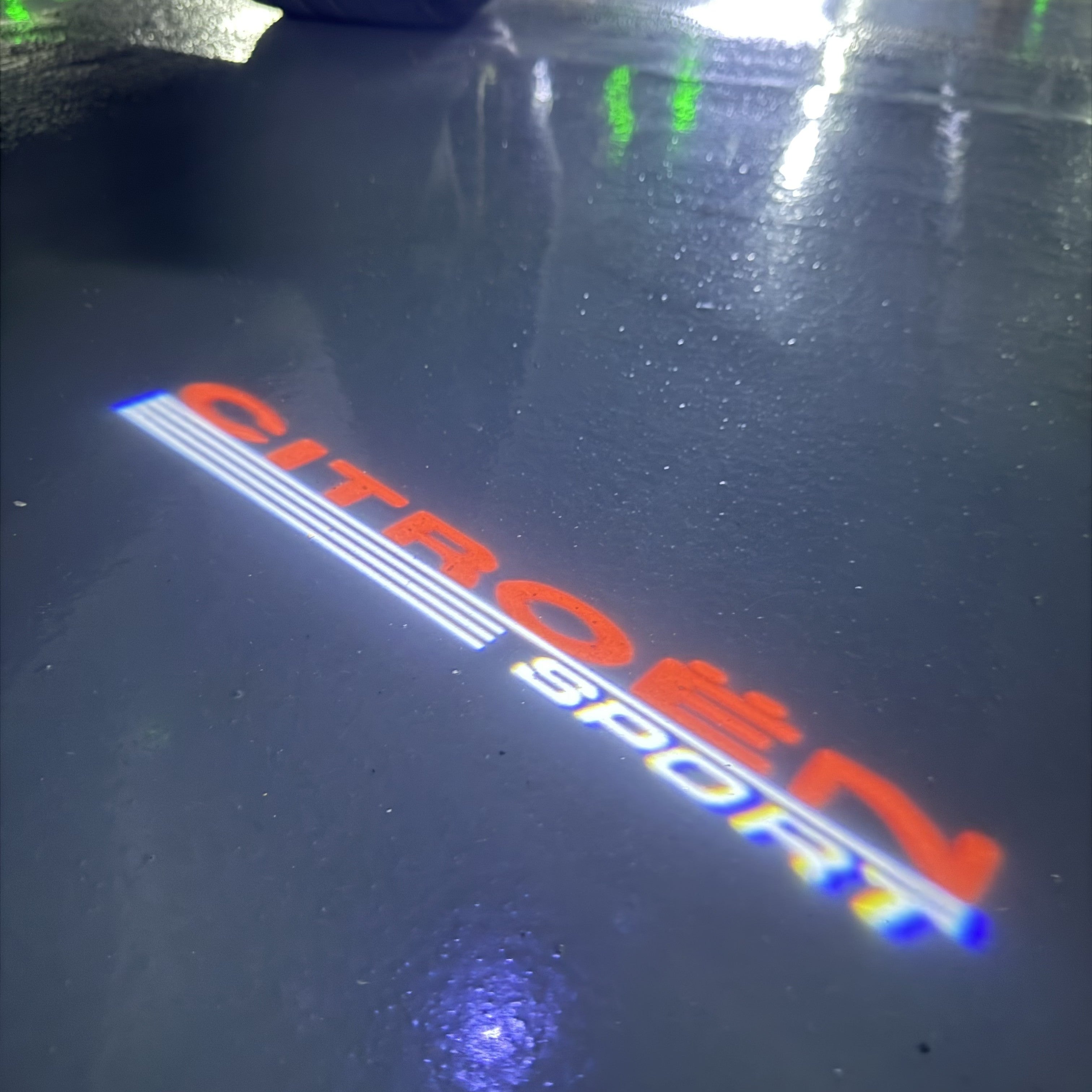 CITROËN SPORT  LOGO PROJECTOT LIGHTS (quantity 1 = 1 sets/2 door lights) Nr.6024q0t0131