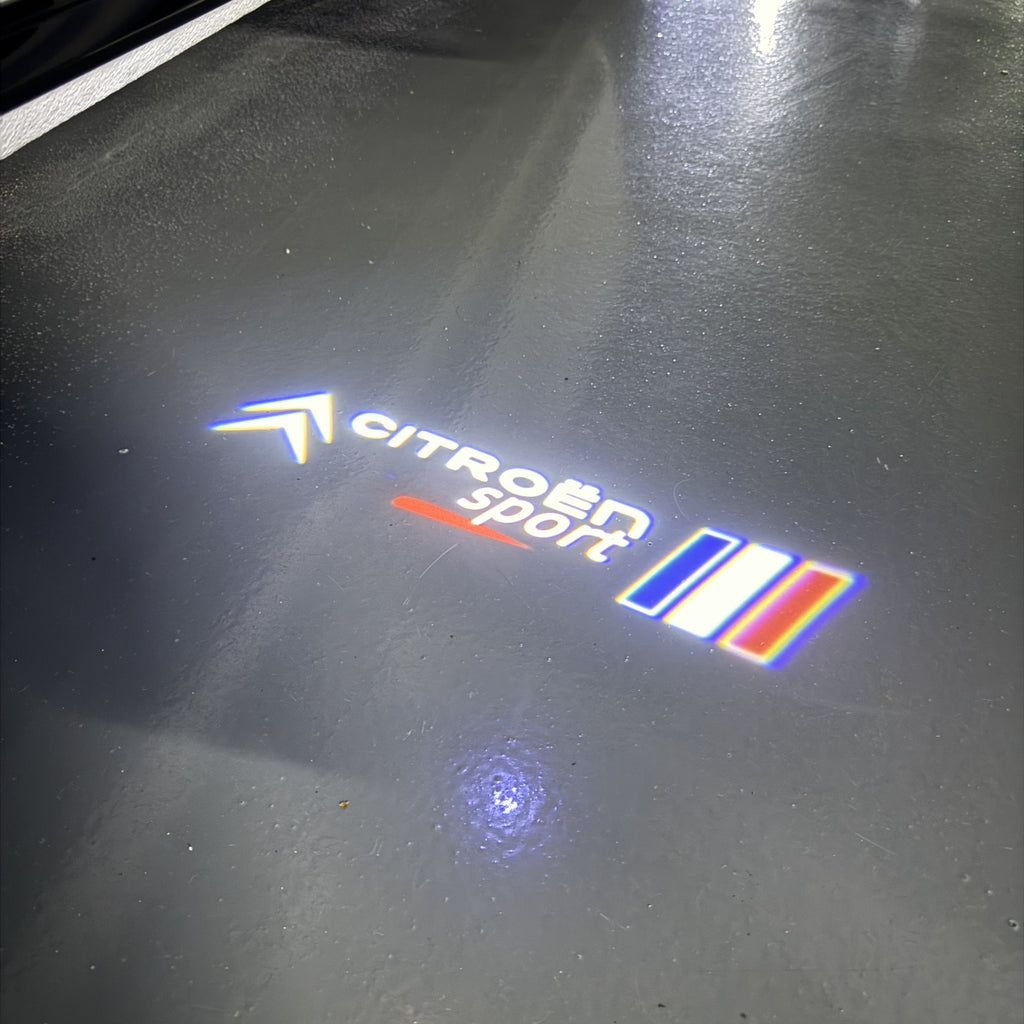 CITROËN SPORT LOGO PROJECTOT LIGHTS (quantity 1 = 1 sets/2 door lights) Nr.6024q0t0134