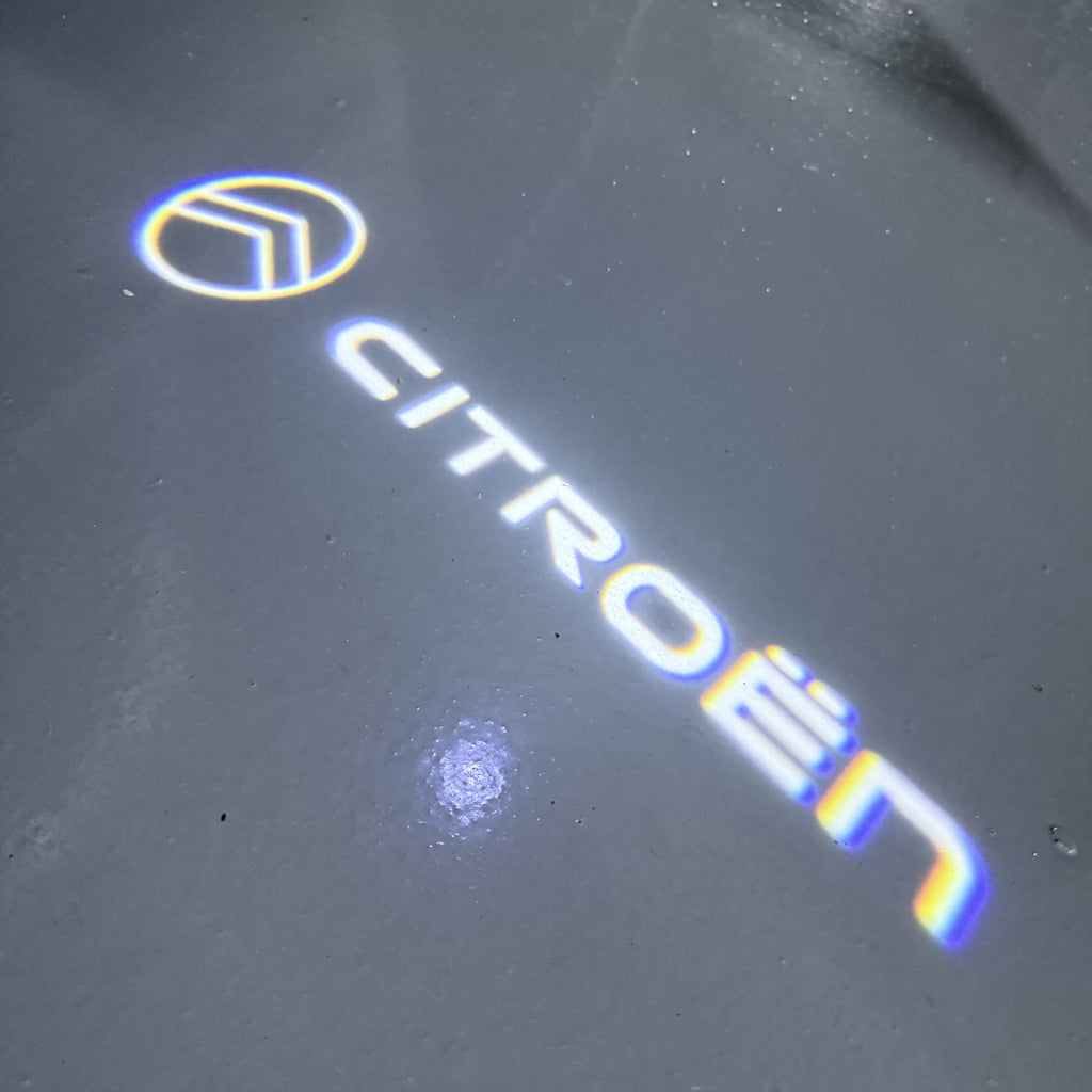 CITROËN Original   LOGO PROJECTOT LIGHTS (quantity 1 = 1 sets/2 door lights) Nr.6024q0t0111