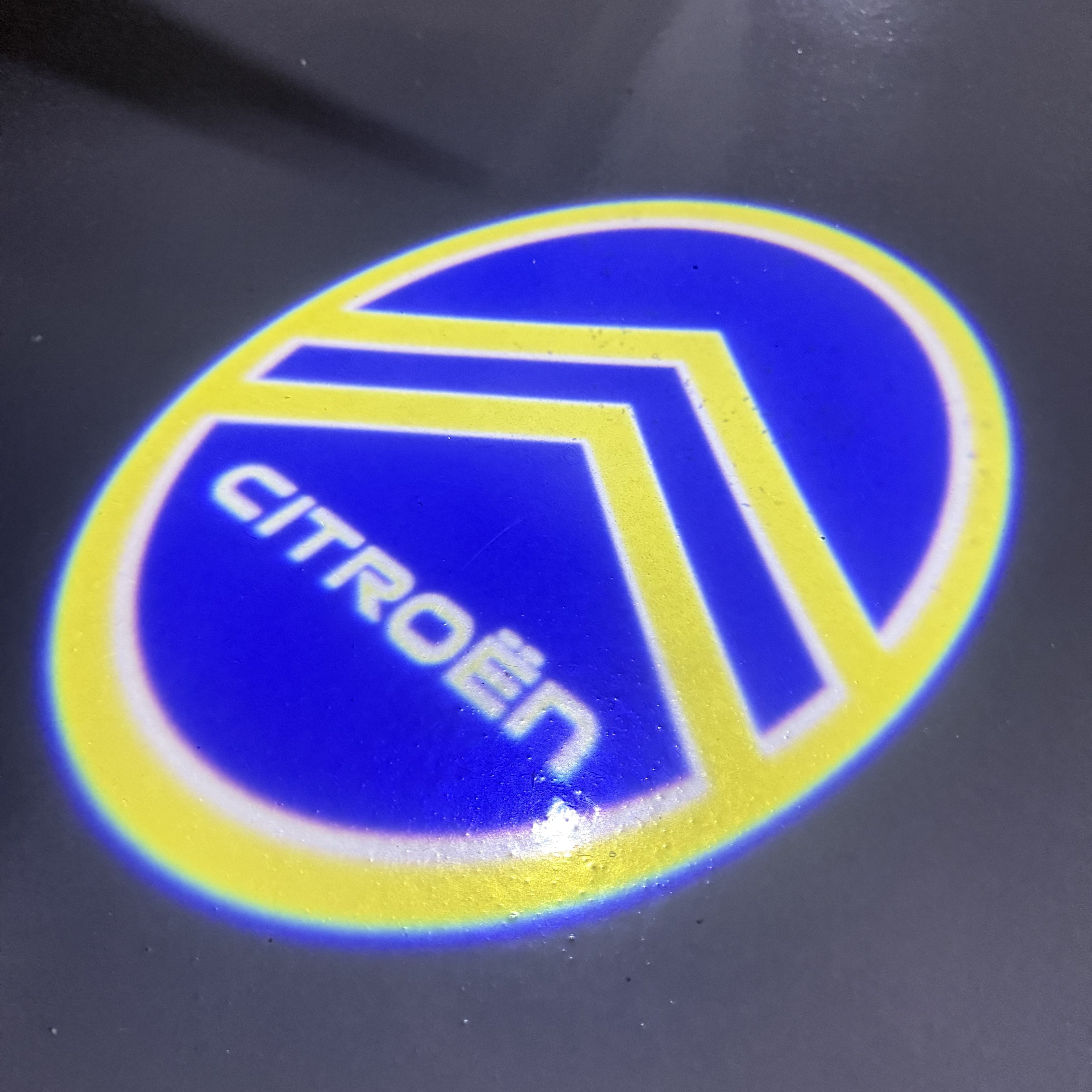 CITROËN Original   LOGO PROJECTOT LIGHTS (quantity 1 = 1 sets/2 door lights) Nr.6024q0t0120