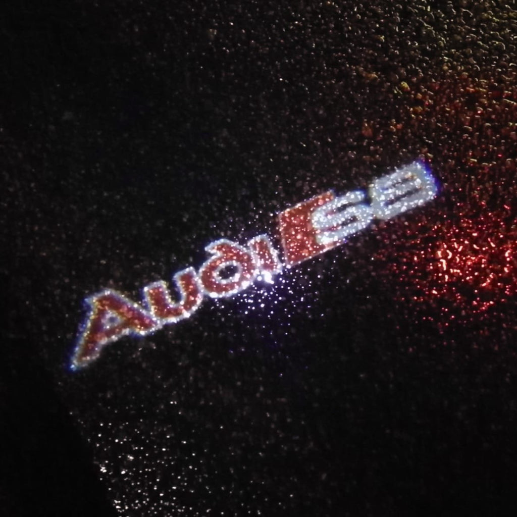 AUDI LOGO PROJECTOT LIGHTS Nr.94 (Menge 1 = 2 Logofolien /2 Türleuchten)
