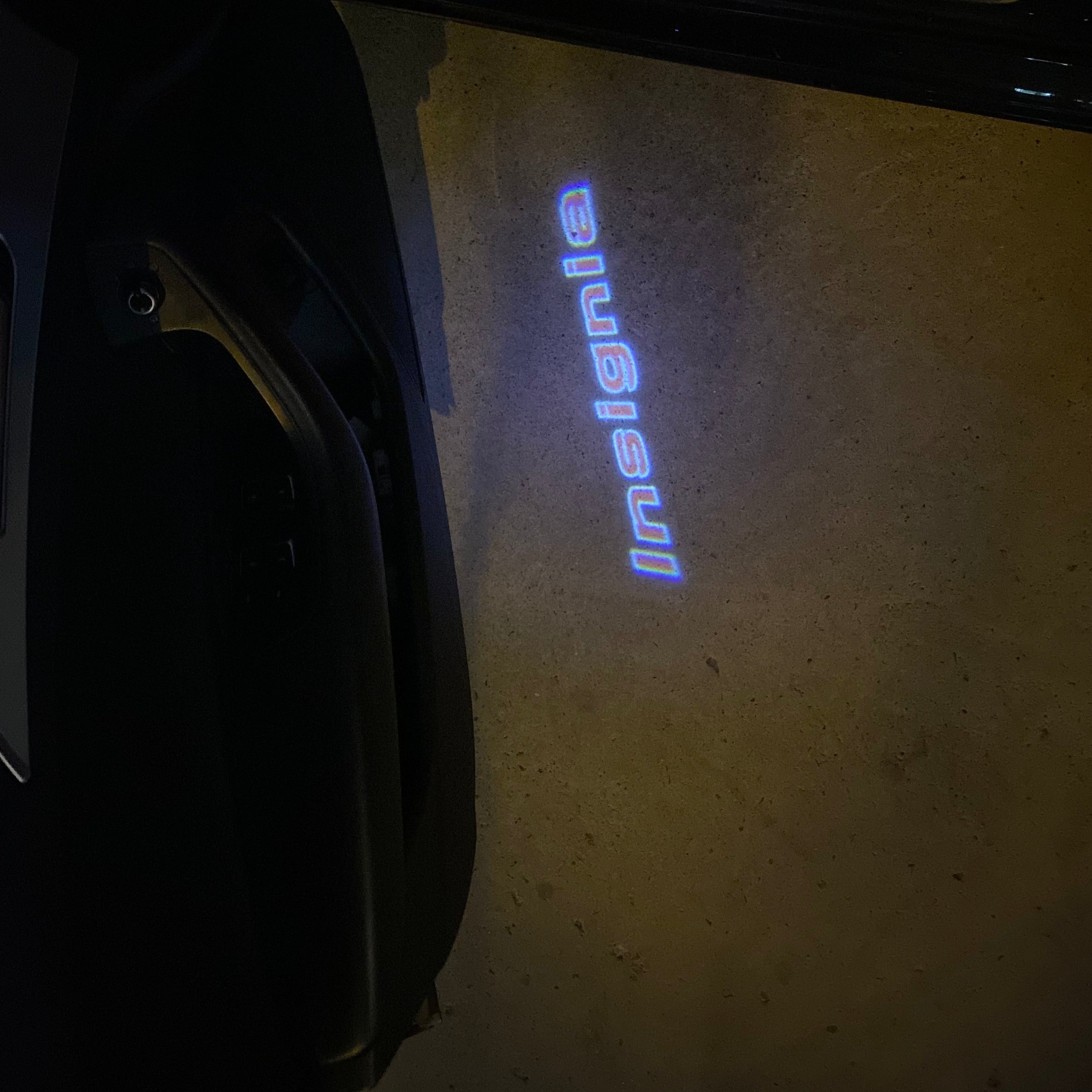 Opel Insignia Original  LOGO PROJECROTR LIGHTS Nr.1440 (quantity 1 = 1 sets/2 door lights)
