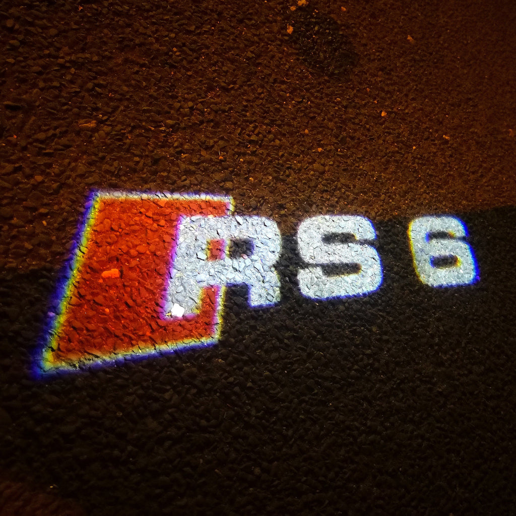 LUCES DE PROYECTOR LOGO AUDI Nr.55 (cantidad 1 = 2 películas con logotipo / 2 luces de puerta)