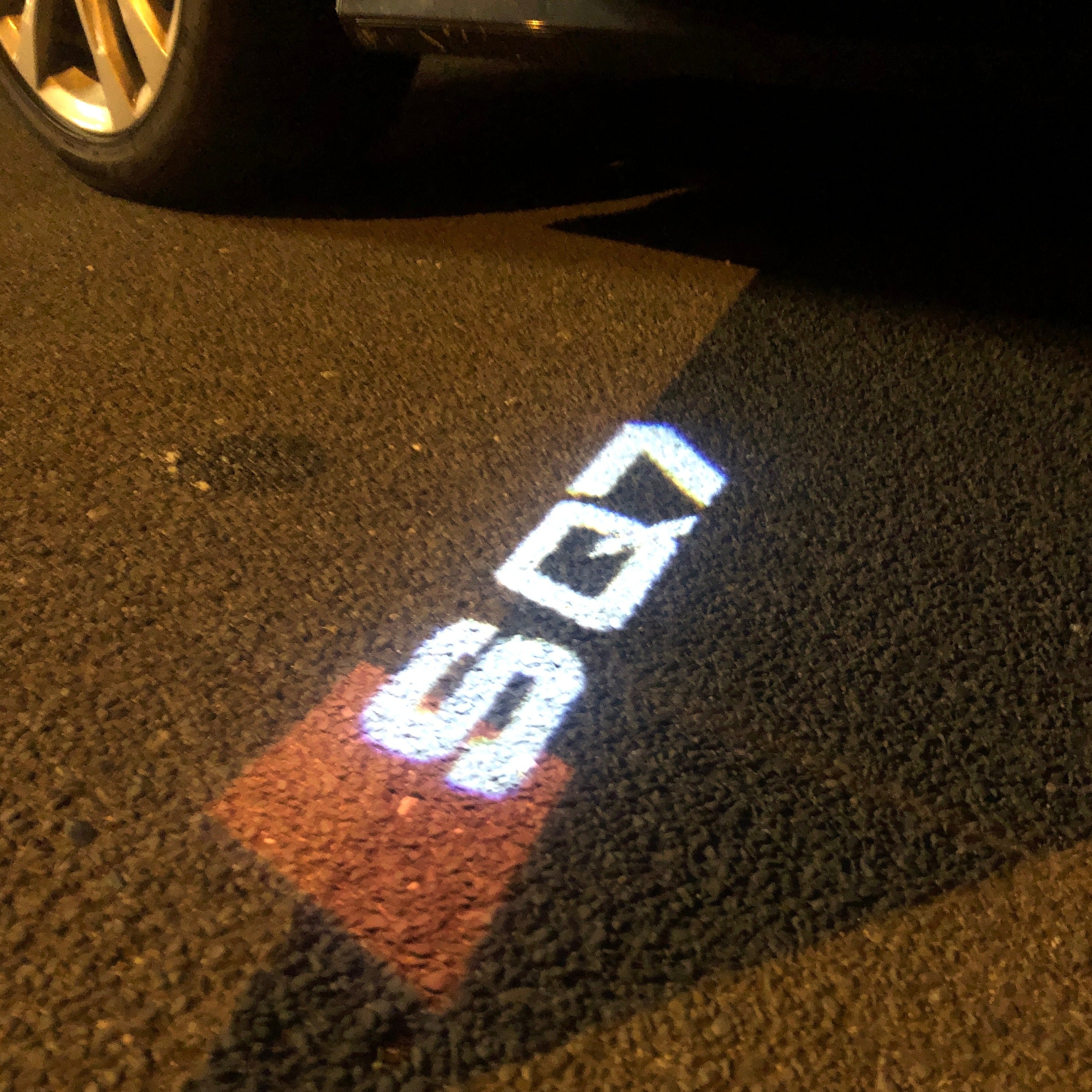LUCI PROIETTORI LOGO AUDI Nr.59 (quantità 1 = 2 Pellicole Logo / 2 luci porta)