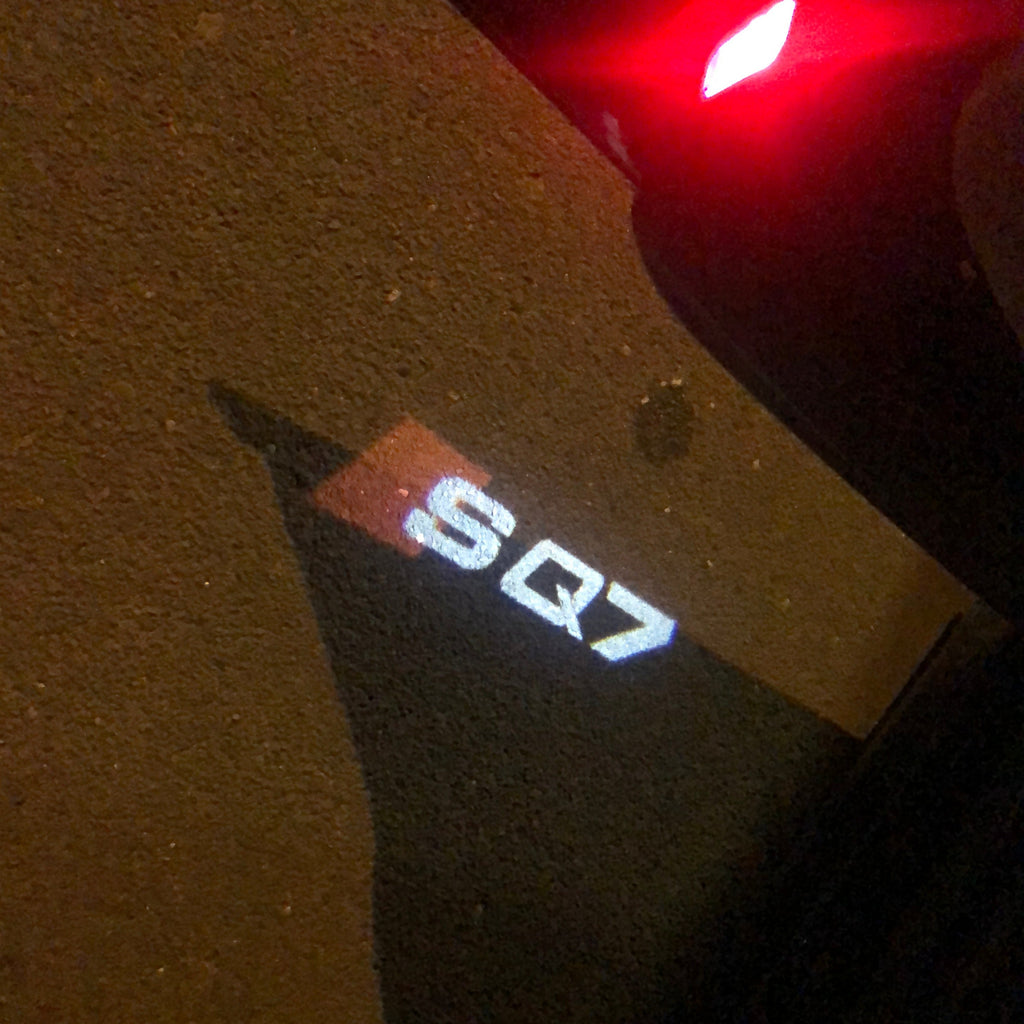 LUCI PROIETTORI LOGO AUDI Nr.59 (quantità 1 = 2 Pellicole Logo / 2 luci porta)