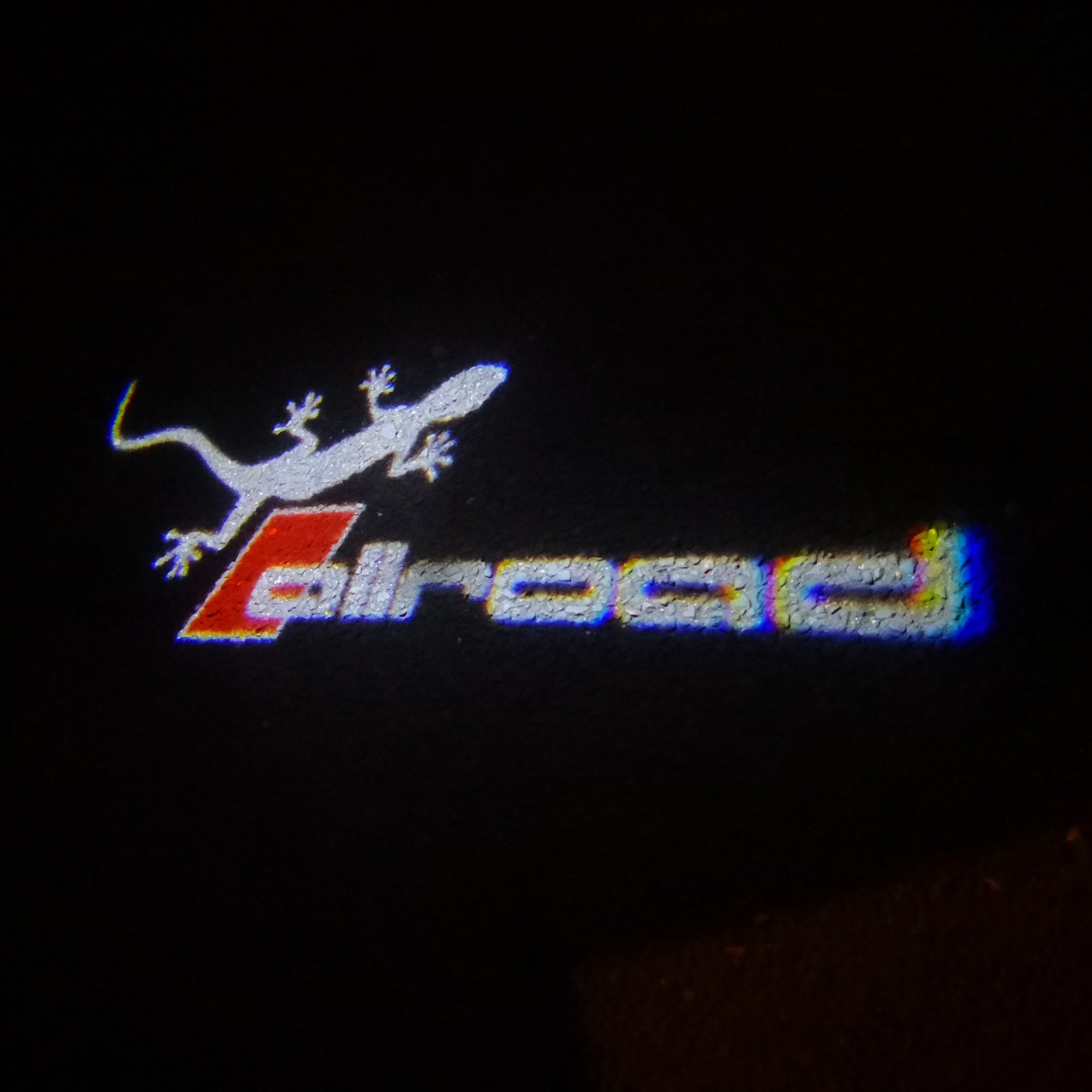 AUDI ALLROAD GECKO LOGO PROJEKTORLEUCHTEN Nr.147 (Anzahl 1 = 2 Logo Folien & 2 Türleuchten)