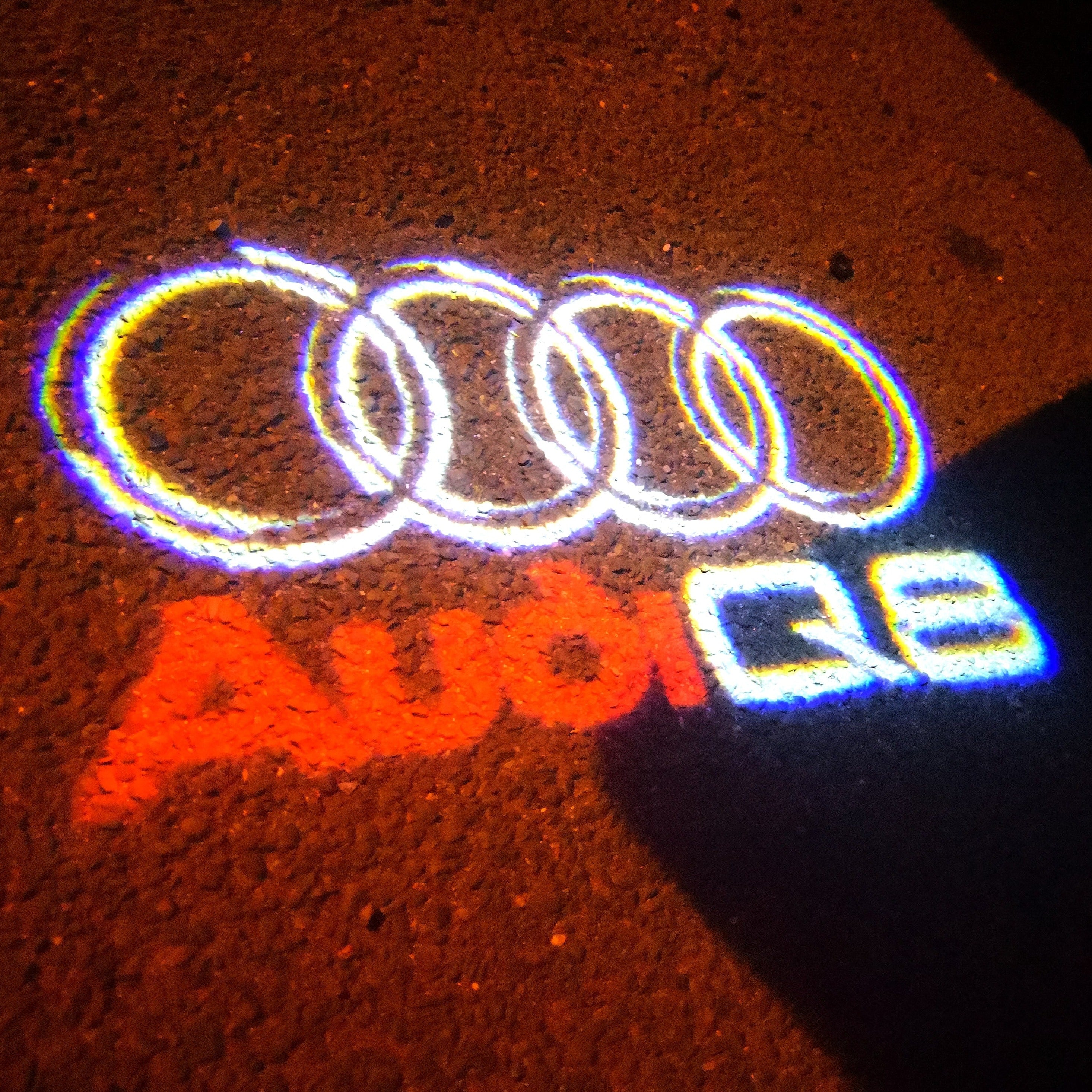 LUCES DE PROYECTOR LOGO AUDI Nr.50 (cantidad 1 = 2 películas con logotipo / 2 luces de puerta)
