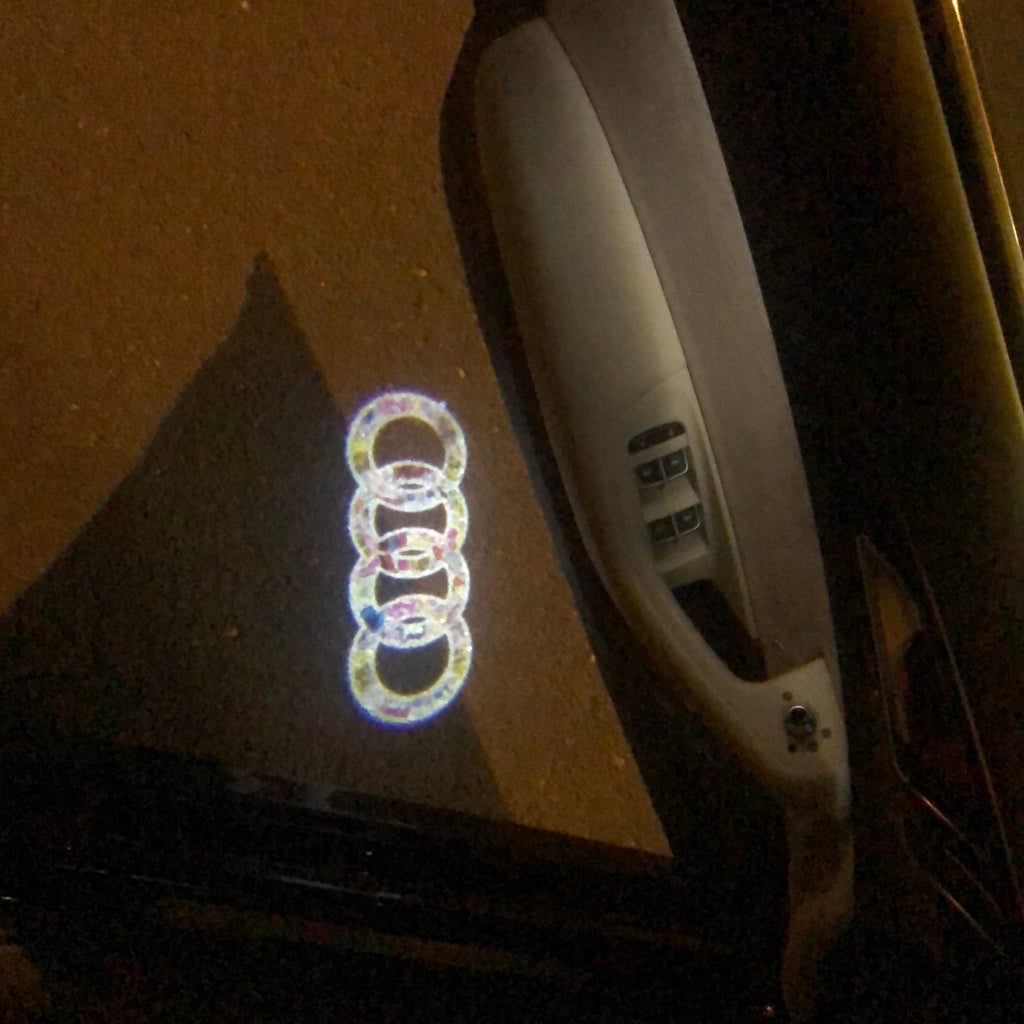AUDI LOGO PROJECTOT LIGHTS Nr.10 (quantité 1 = 2 Logo Films /2 feux de porte)