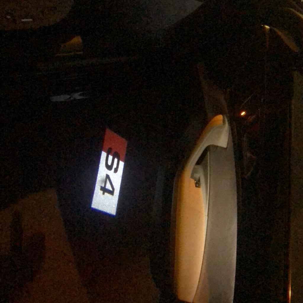 AUDI LOGO PROJECTOT LIGHTS Nr.131 (cantidad 1 = 2 logo films /2 luces de puerta)