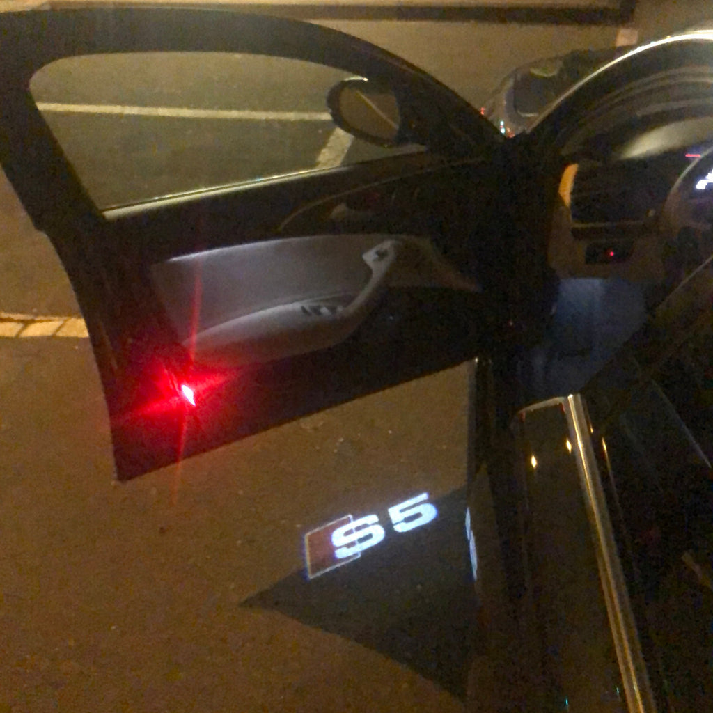 AUDI LOGO PROJECTOT LIGHTS Nr.26 (cantidad 1 = 2 logo films /2 luces de puerta)