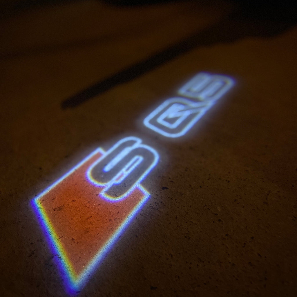 AUDI LOGO PROJECTOT LIGHTS Nr.19 (quantité 1 = 2 Logo Films /2 feux de porte)