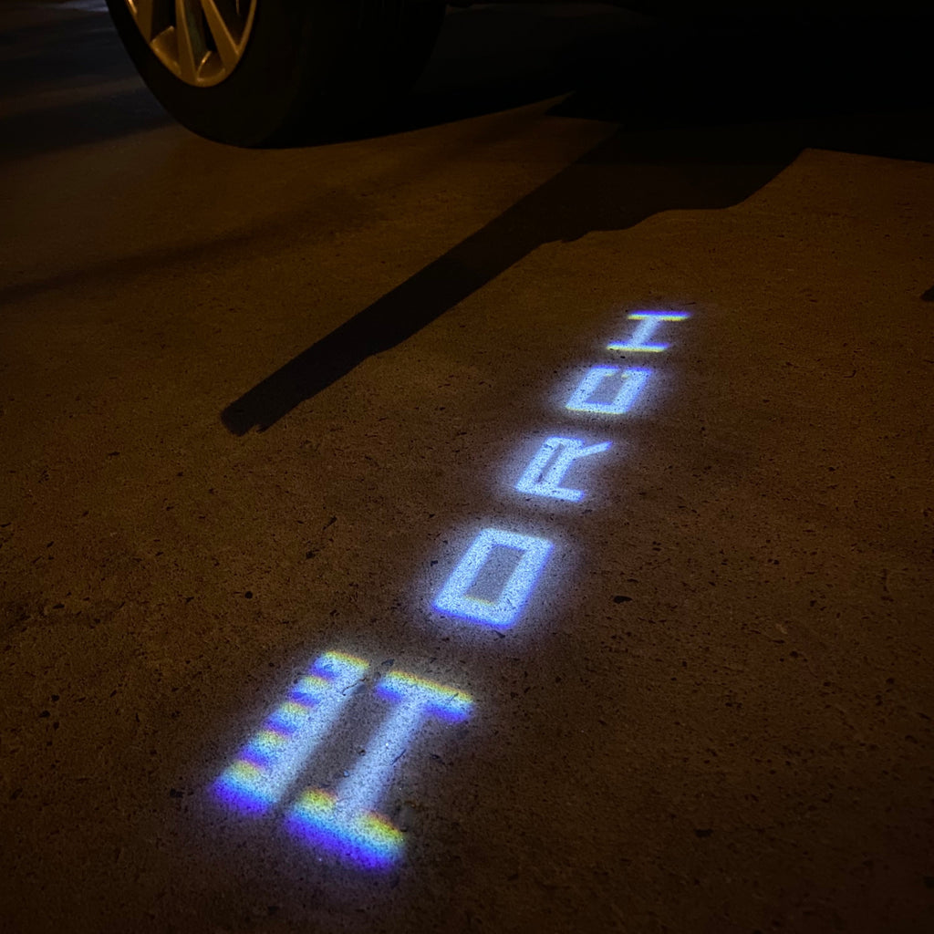 AUDI LOGO PROJECTOT LIGHTS Nr.19 (quantité 1 = 2 Logo Films /2 feux de porte)