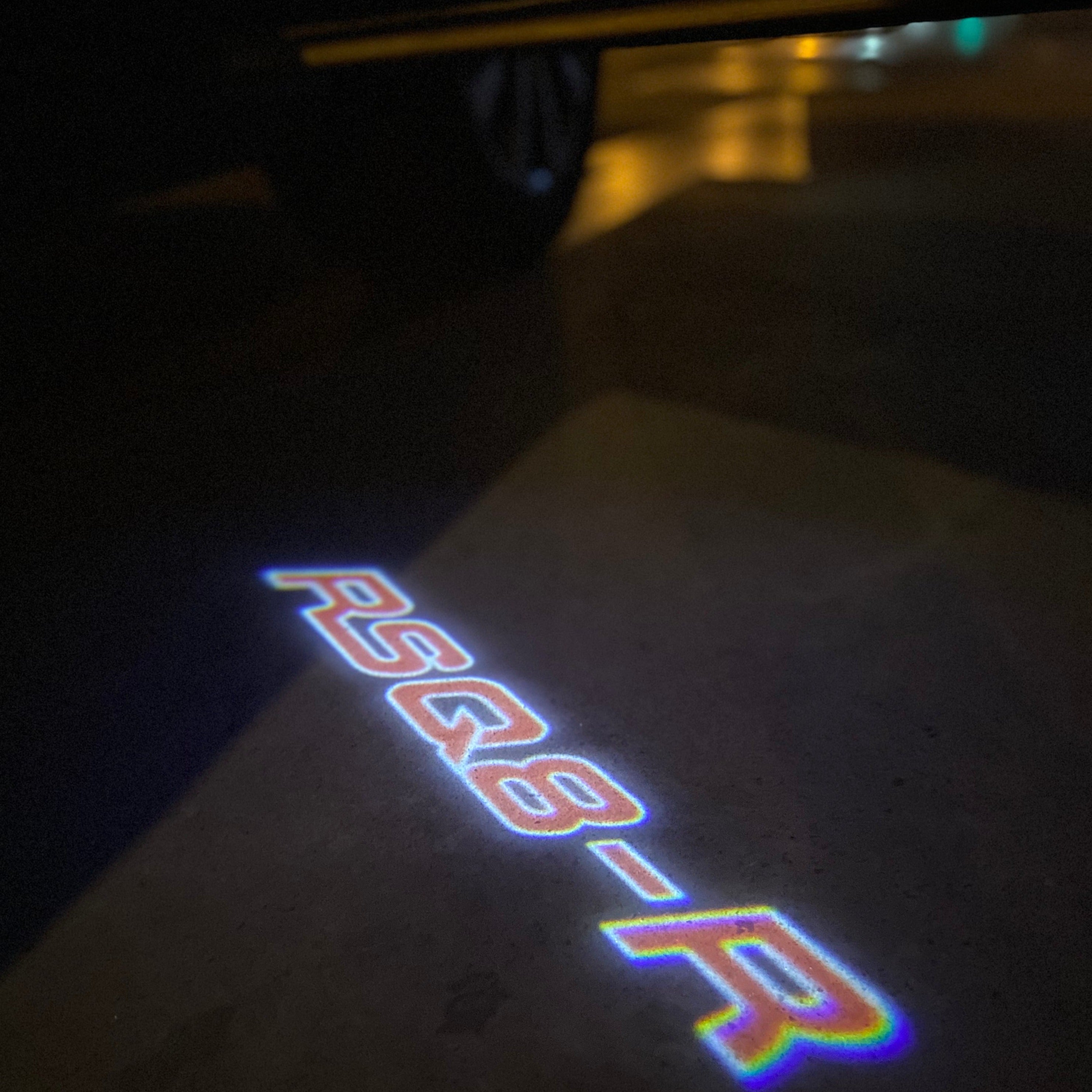 AUDI LOGO PROJECTOT LIGHTS Nr.19 (quantité 1 = 2 Logo Films /2 feux de porte)