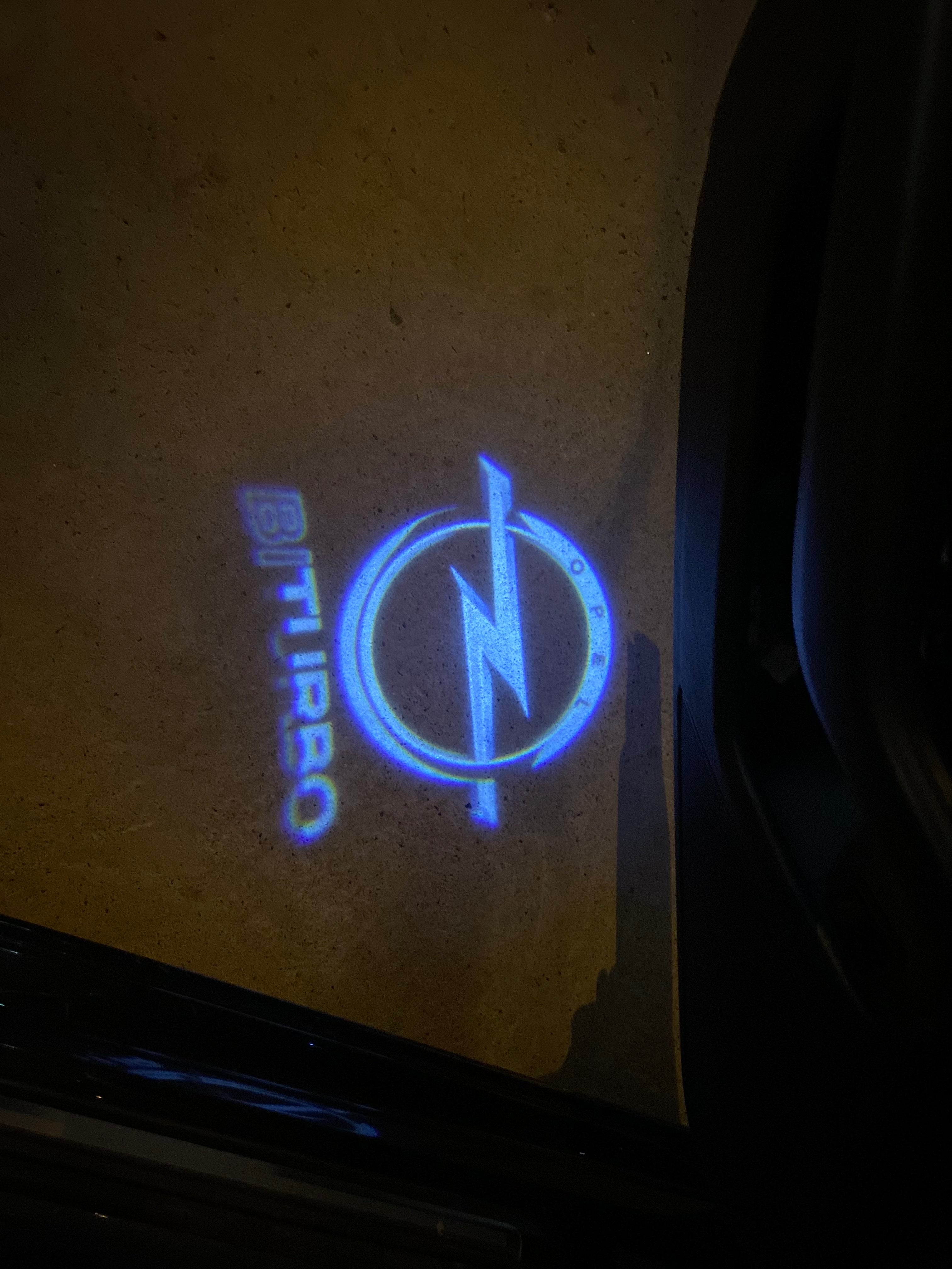 Opel Insignia Original  LOGO PROJECROTR LIGHTS Nr.1413(quantity 1 = 1 sets/2 door lights)