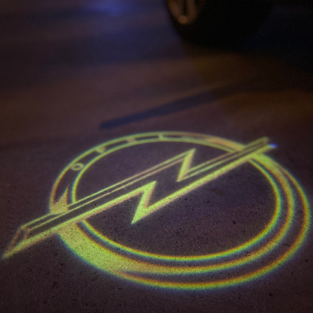Opel  Original  LOGO PROJECROTR LIGHTS Nr.1421 (quantity 1 = 1 sets/2 door lights)