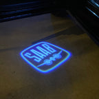 SAAB  Original LOGO PROJECROTR LIGHTS Nr.2514 (quantity 1 = 1 sets/2 door lights)