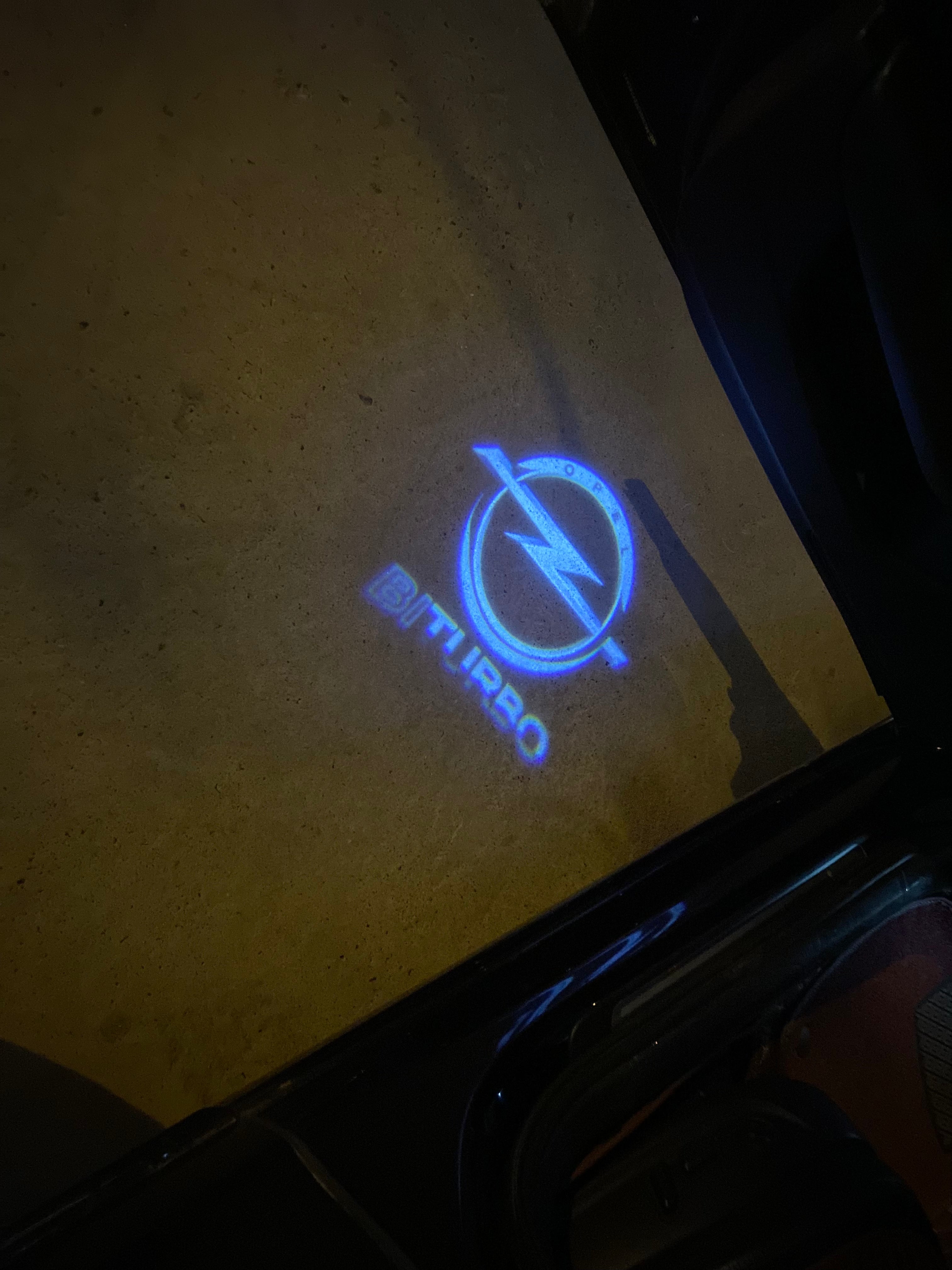 Opel Insignia Original  LOGO PROJECROTR LIGHTS Nr.1413(quantity 1 = 1 sets/2 door lights)