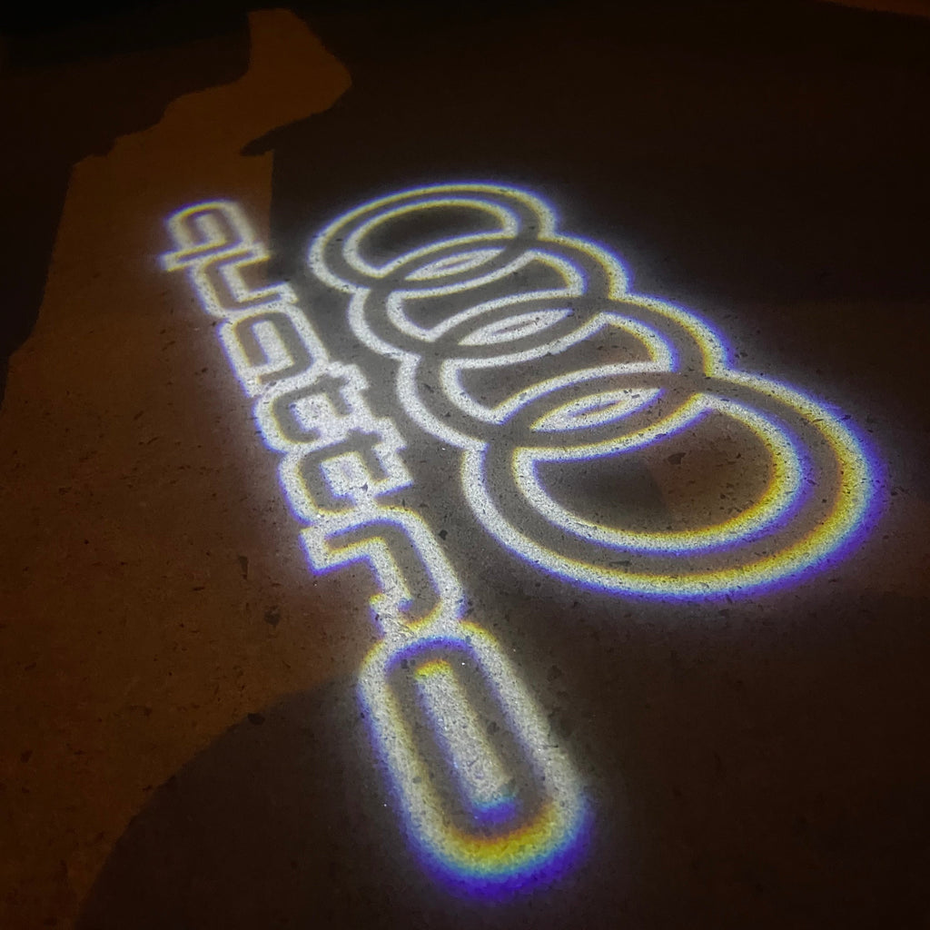 AUDI LOGO PROJECTOT LIGHTS Nr.19 (quantité 1 = 2 Logo Films /2 feux de porte)