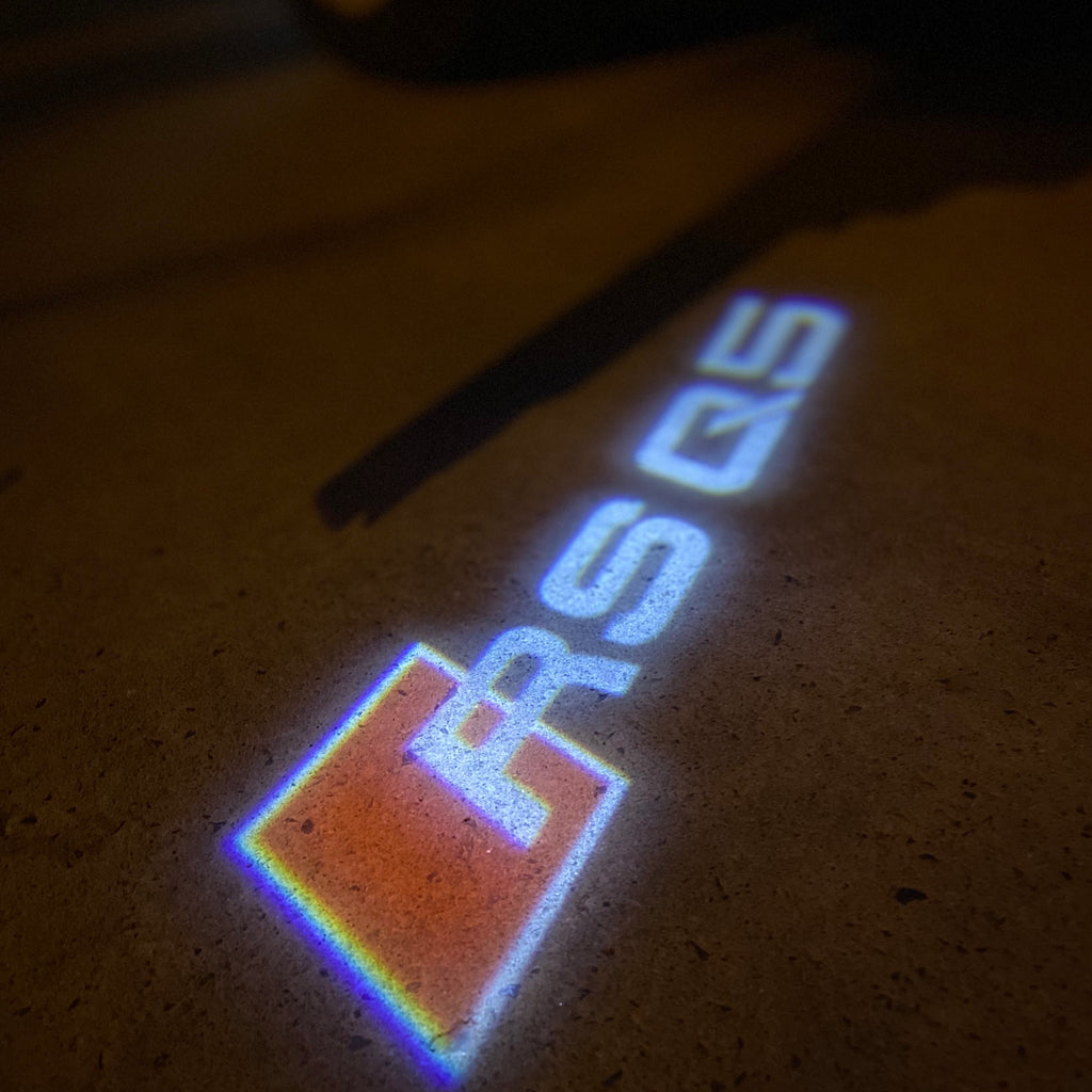 AUDI LOGO PROJECTOT LIGHTS Nr.19 (quantité 1 = 2 Logo Films /2 feux de porte)