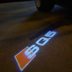 AUDI LOGO PROJECTOT LIGHTS Nr.58 (Menge 1 = 2 Logofolien /2 Türleuchten)