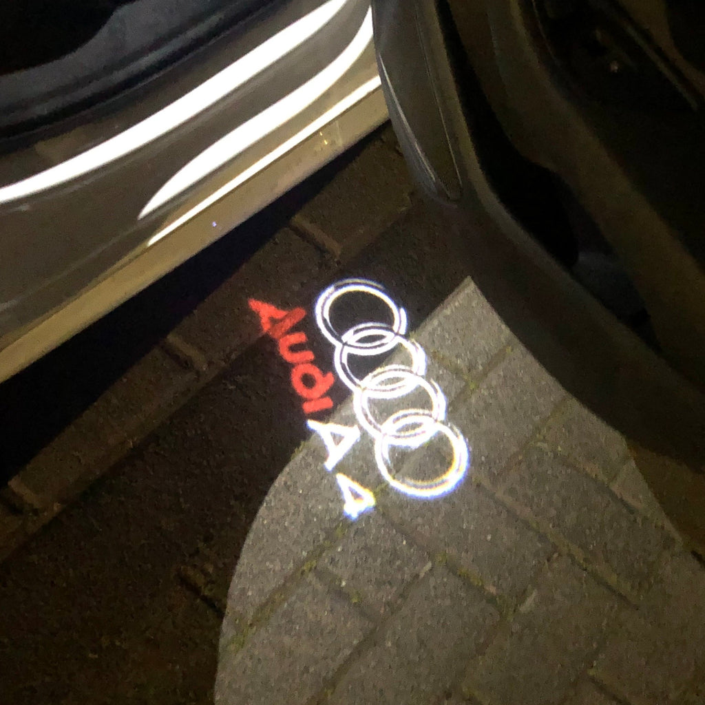 AUDI LOGO PROJECTOT LIGHTS Nr.42 (Menge 1 = 2 Logofolien /2 Türleuchten)