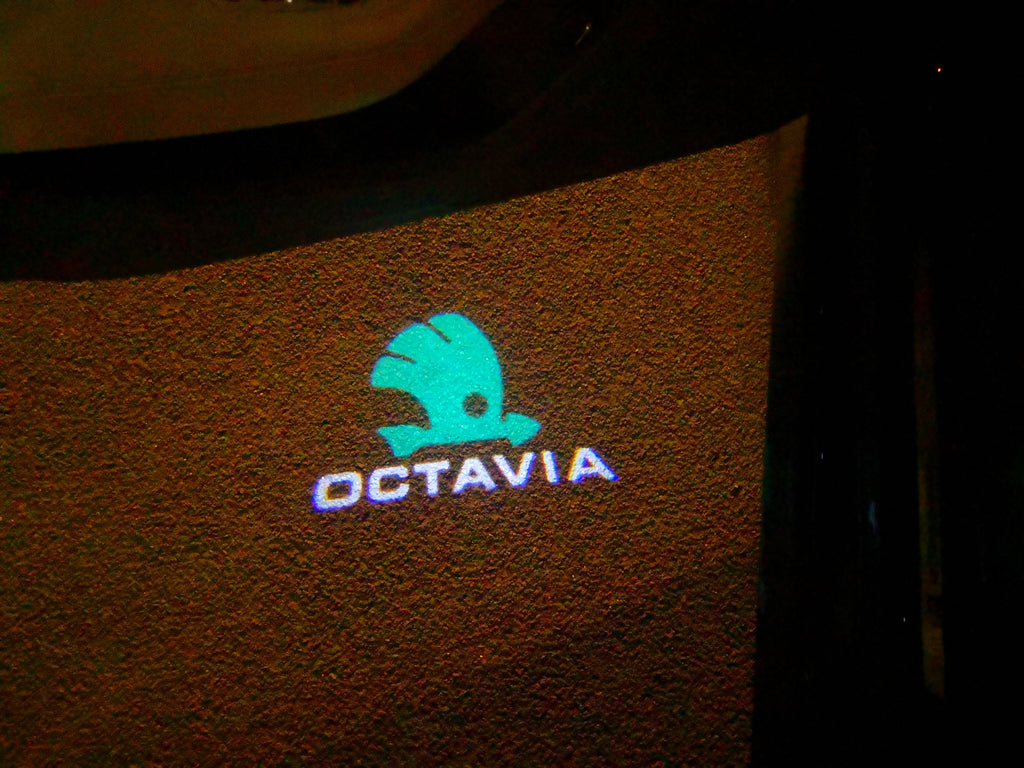 LUCI PROIETTORI LOGO SKODA Nr.78 (quantità 1 = 2 Logo Film / 2 luci porta)