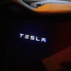 TESLA LOGO PROJECROTR LIGHTS Nr.1516 (quantity  1 =  2 Logo Film /  2 door lights)