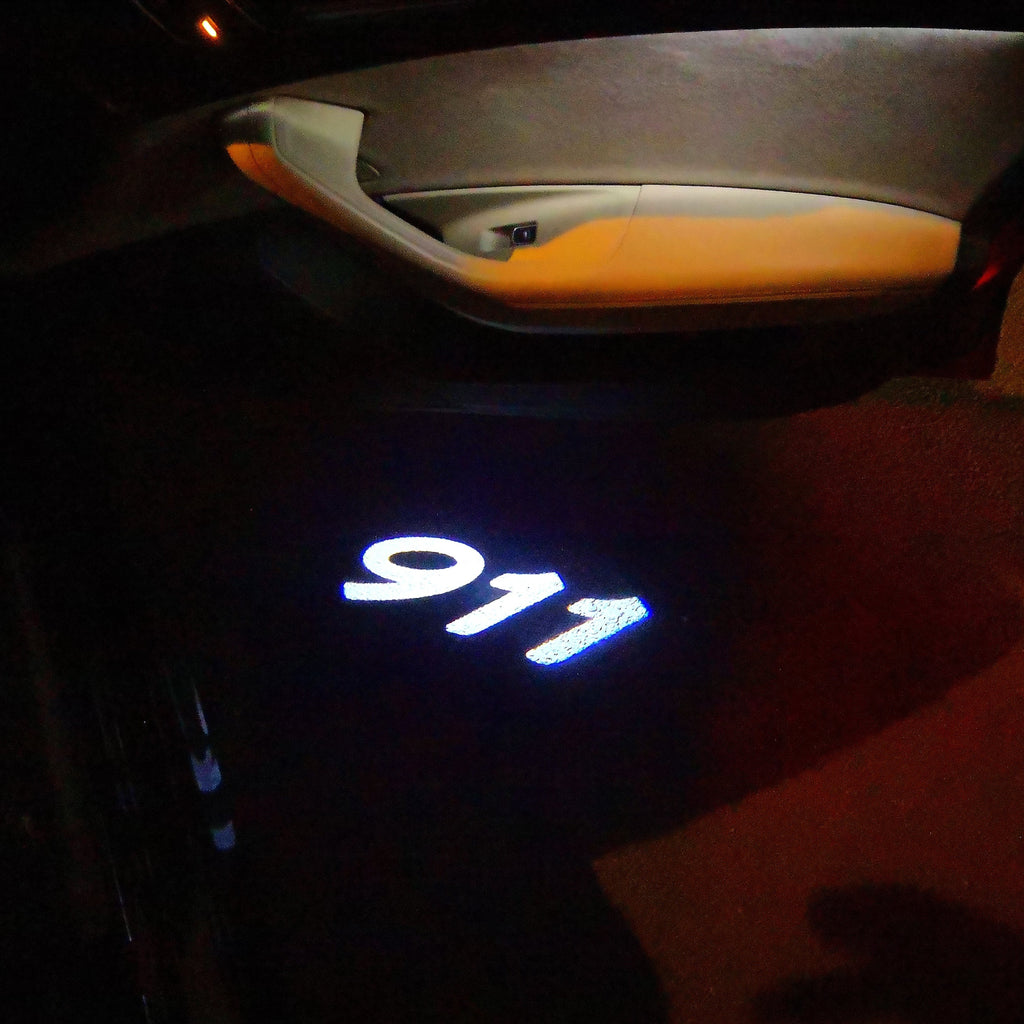 PORSCHE 911 LOGO PROJECTOT LIGHTS Nr.26 (Menge 1 = 2 Logo Film / 2 Türleuchten)